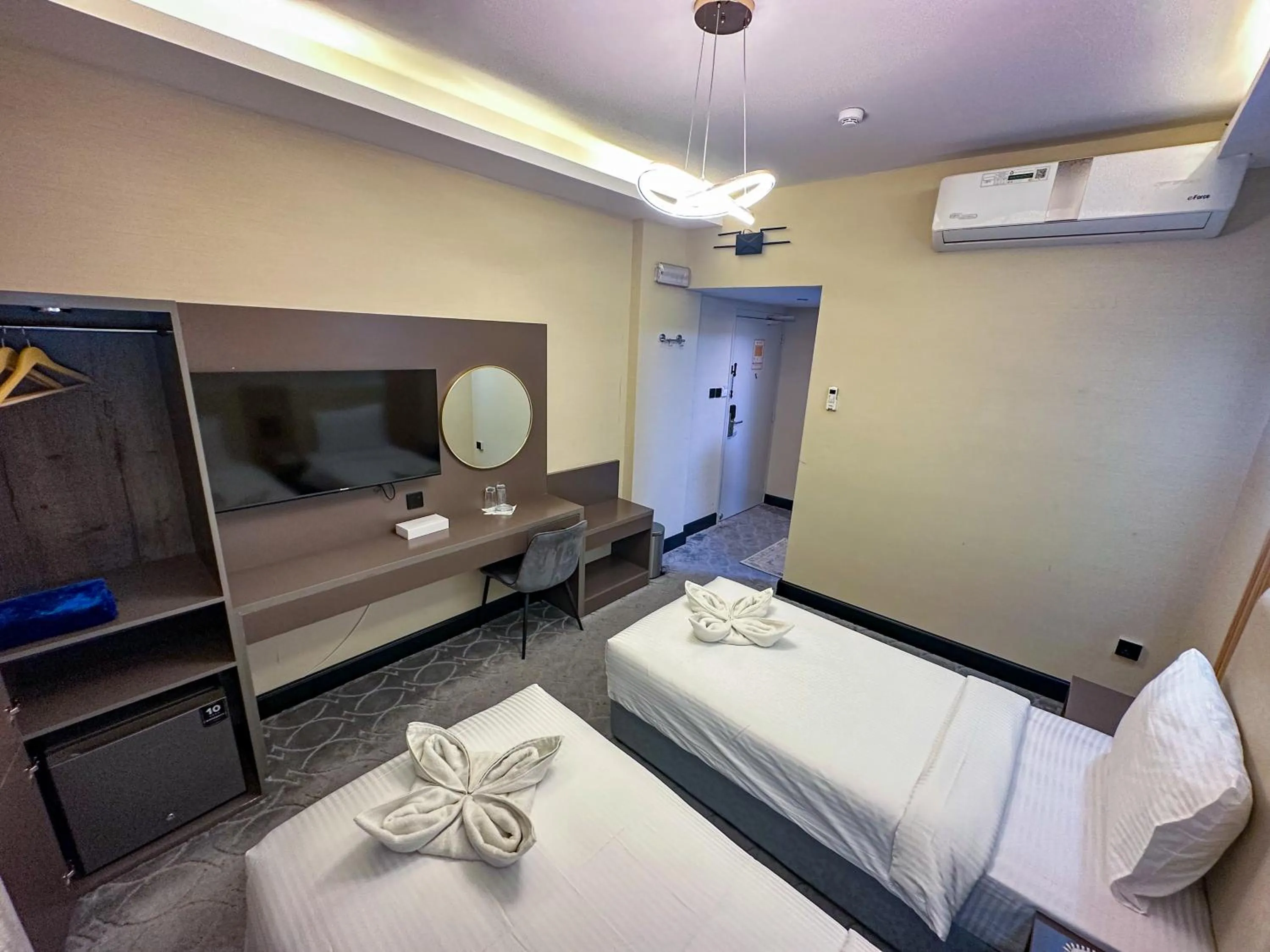 Photo of the whole room, Bed in GOLD SKY AVENUE HOTEL