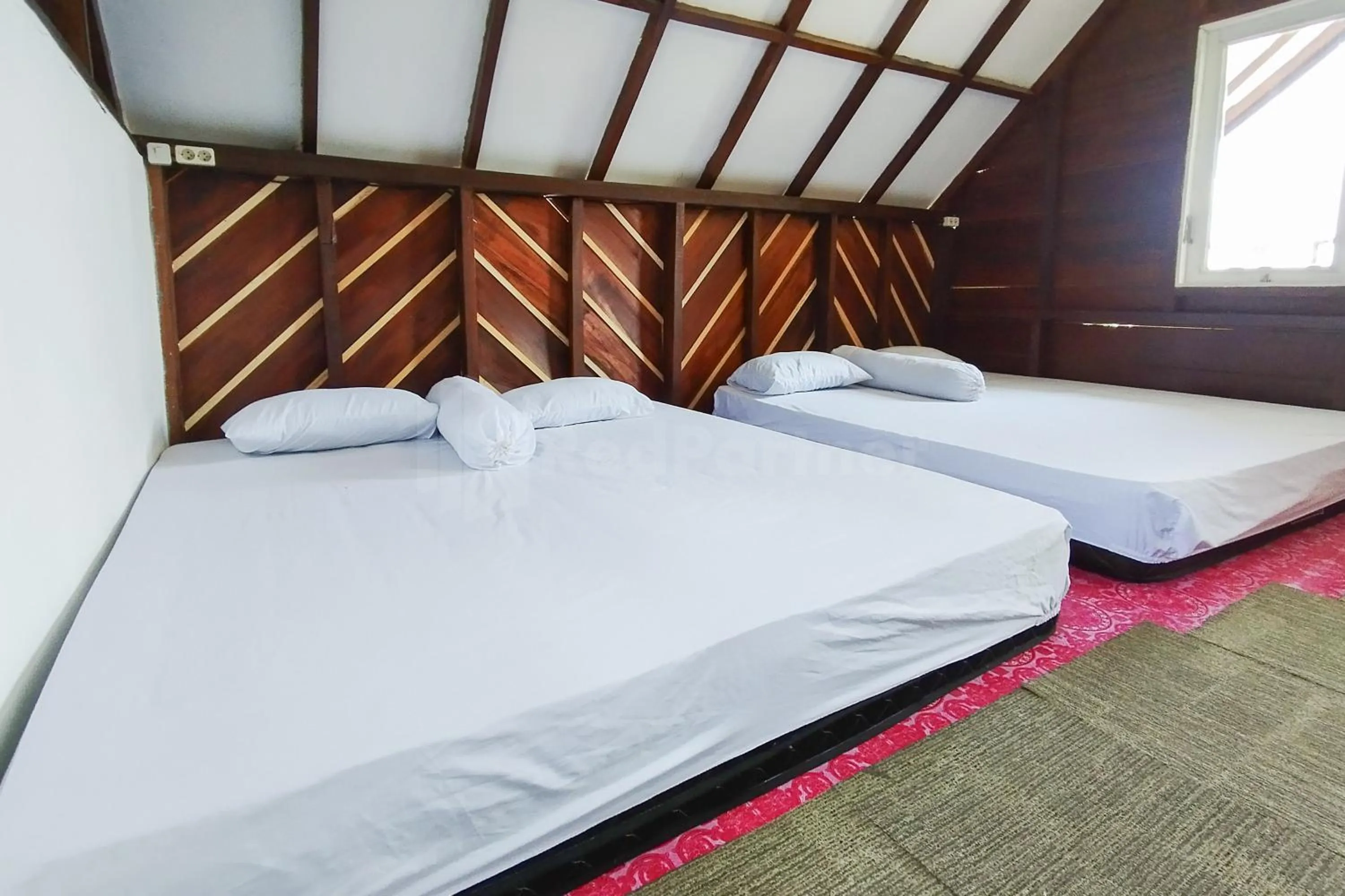 Bed in AS Resto,Café & Hotel Mitra RedDoorz