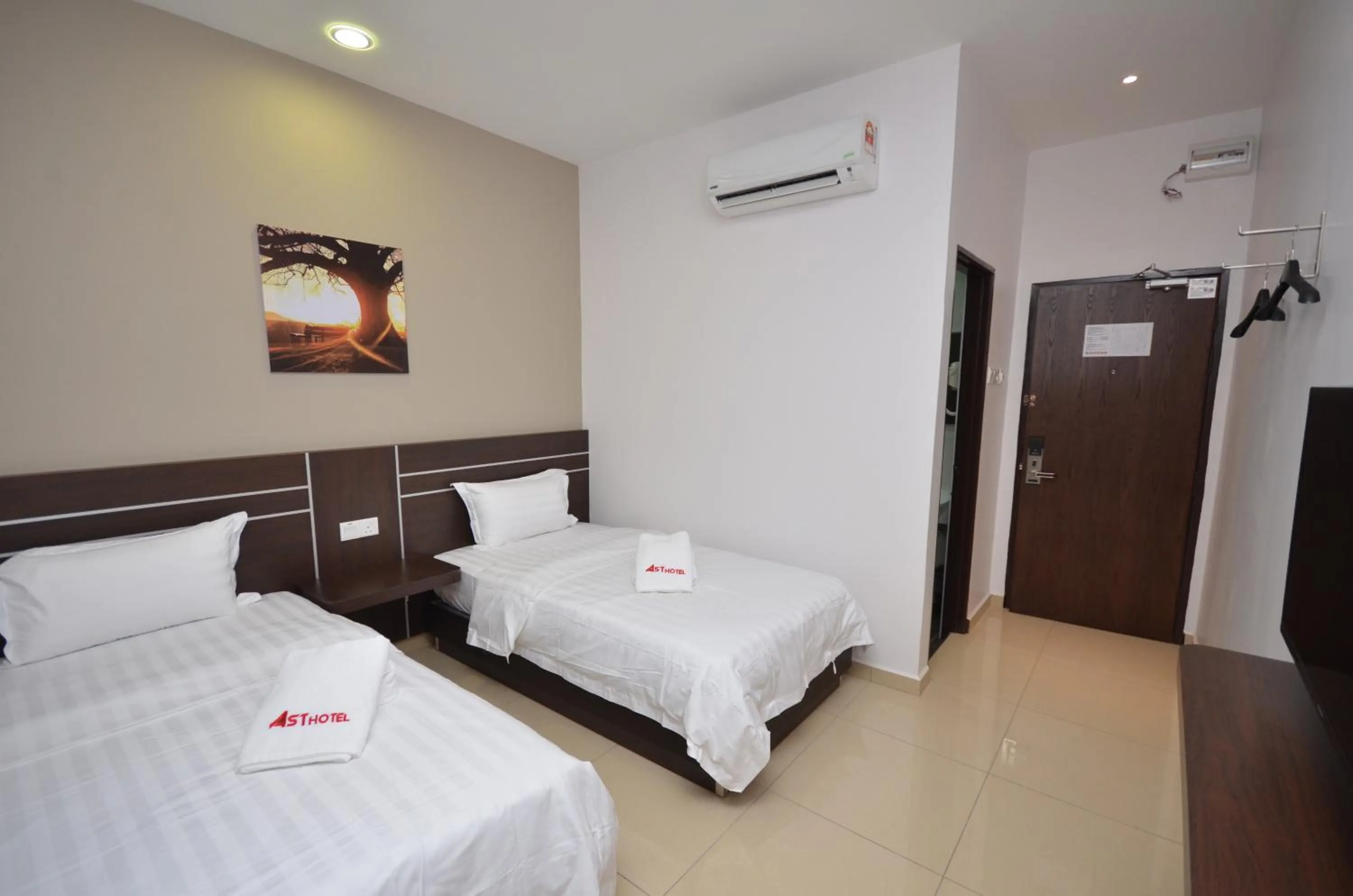 Photo of the whole room, Bed in AST Hotel