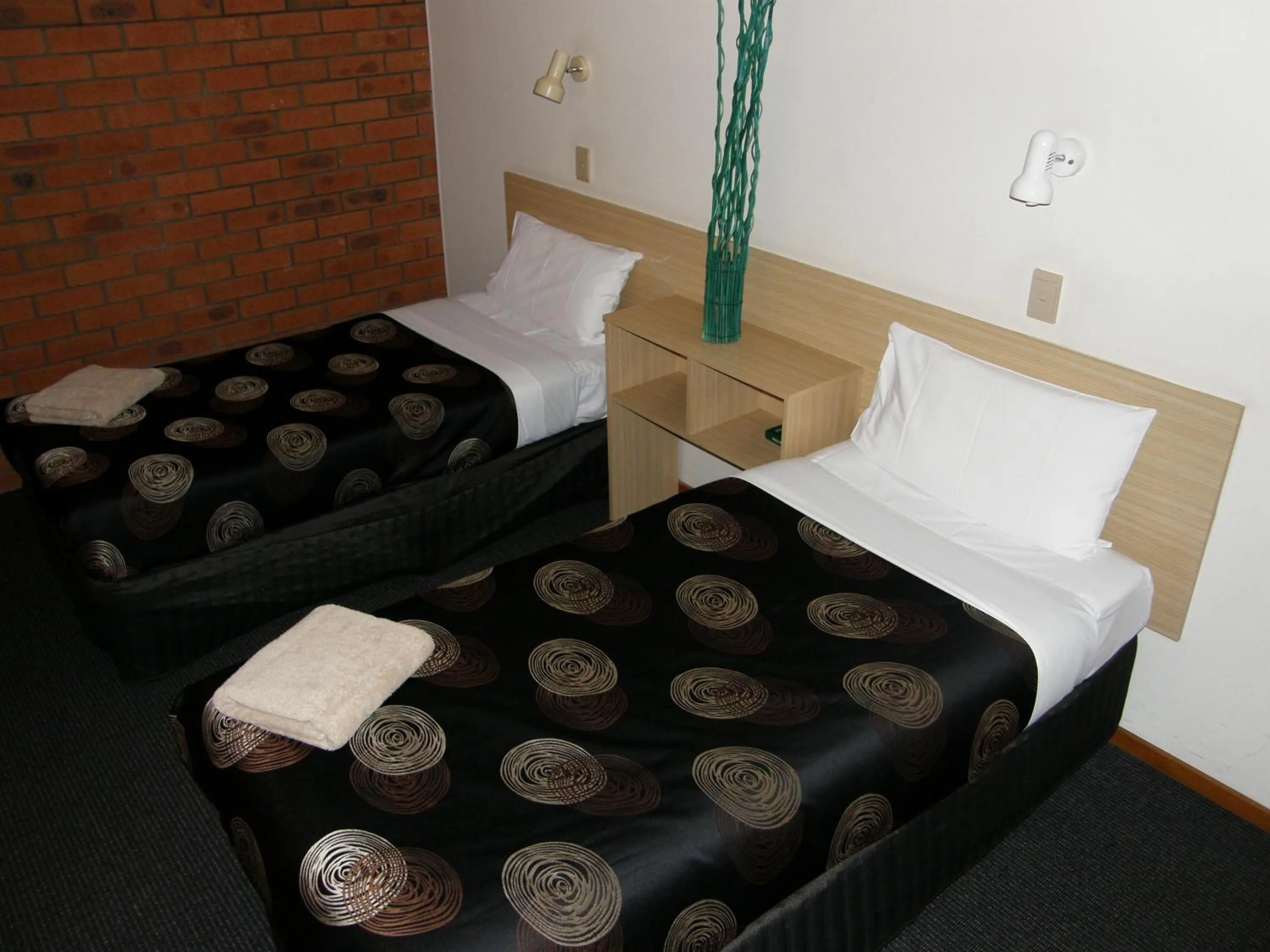 Bed in Shannon Motor Inn