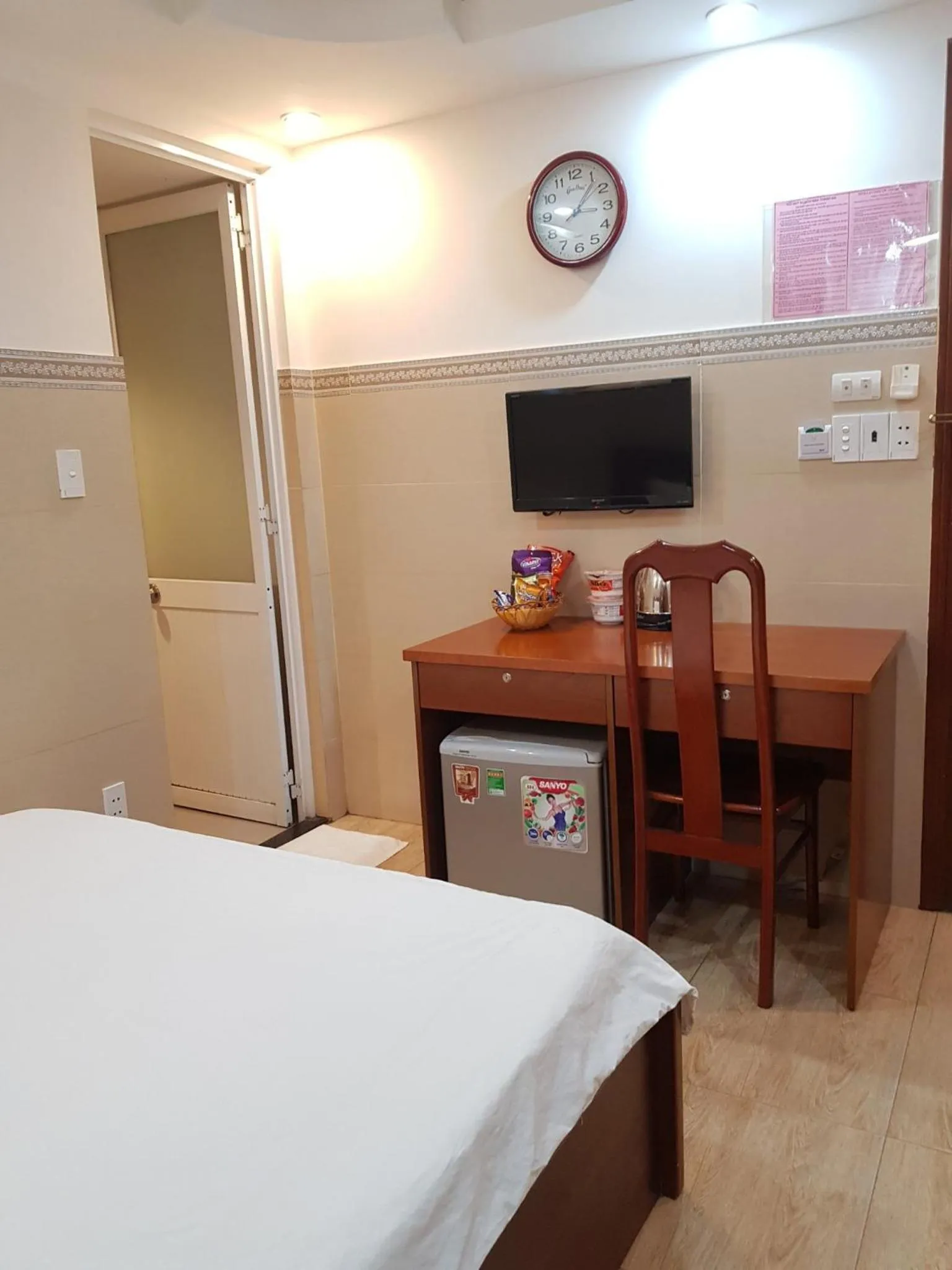 Communal lounge/ TV room, Bed in Thanh An Hotel