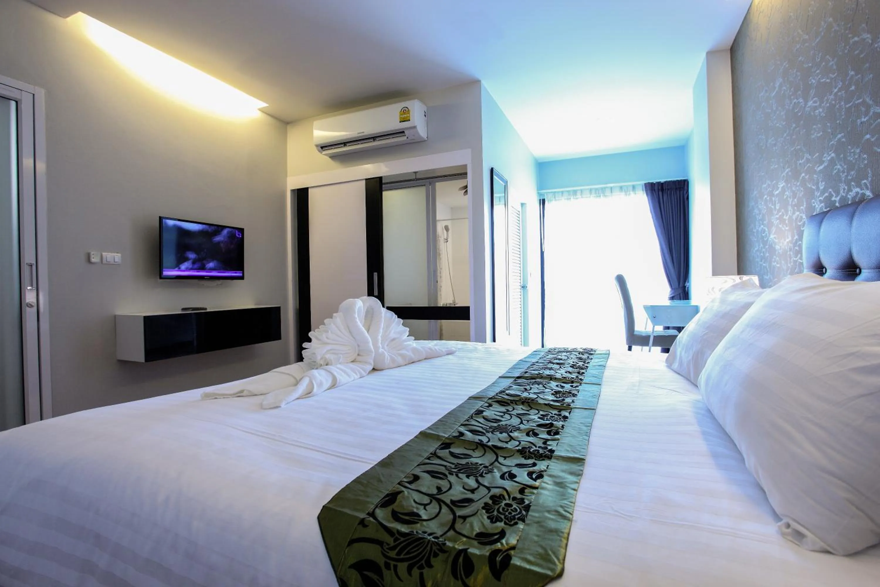 Photo of the whole room, Bed in Romyen Garden Place