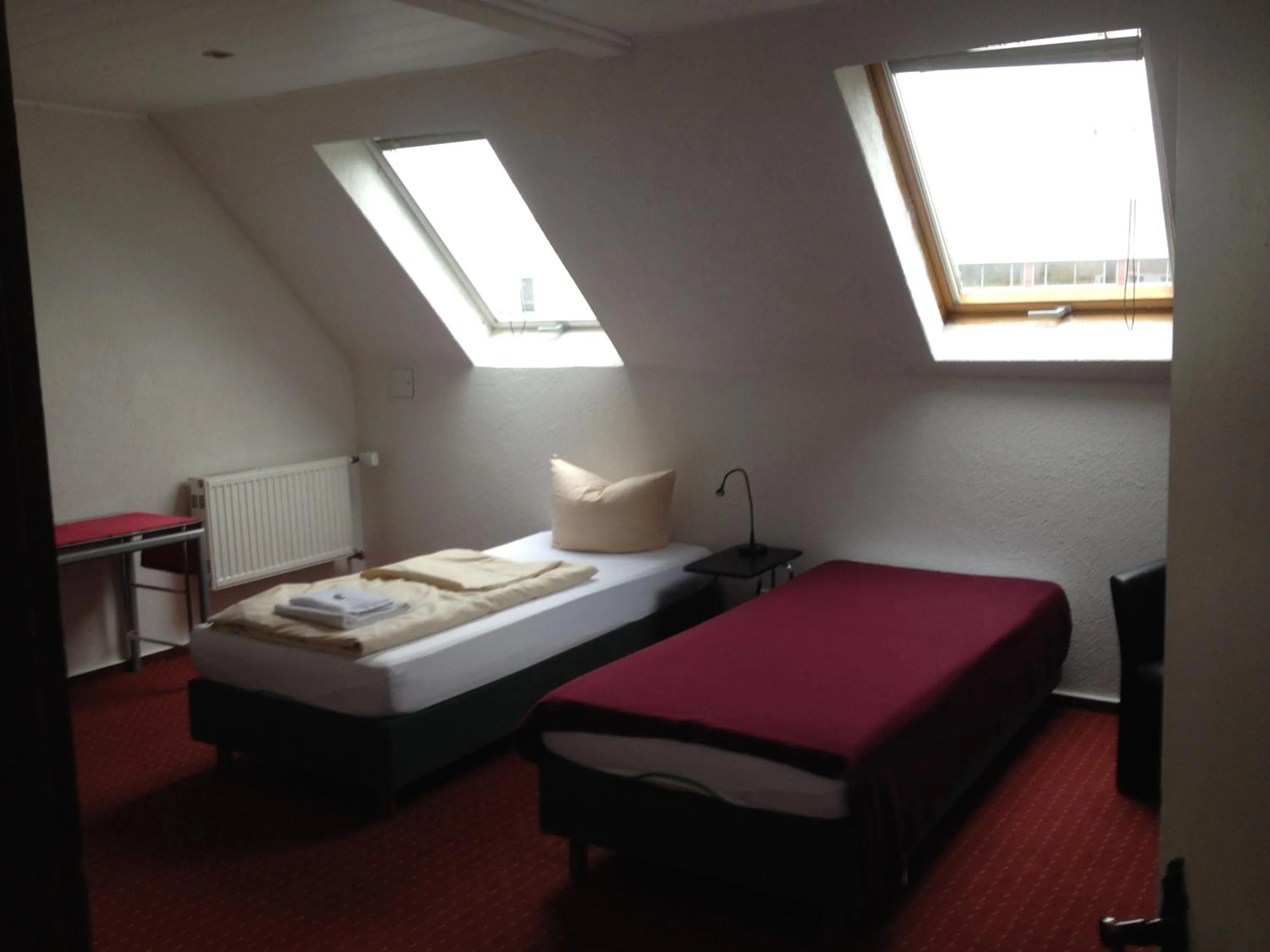 Bedroom, Bed in Hotel Saarland Lebach