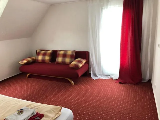 Photo of the whole room, Bed in Hotel Saarland Lebach