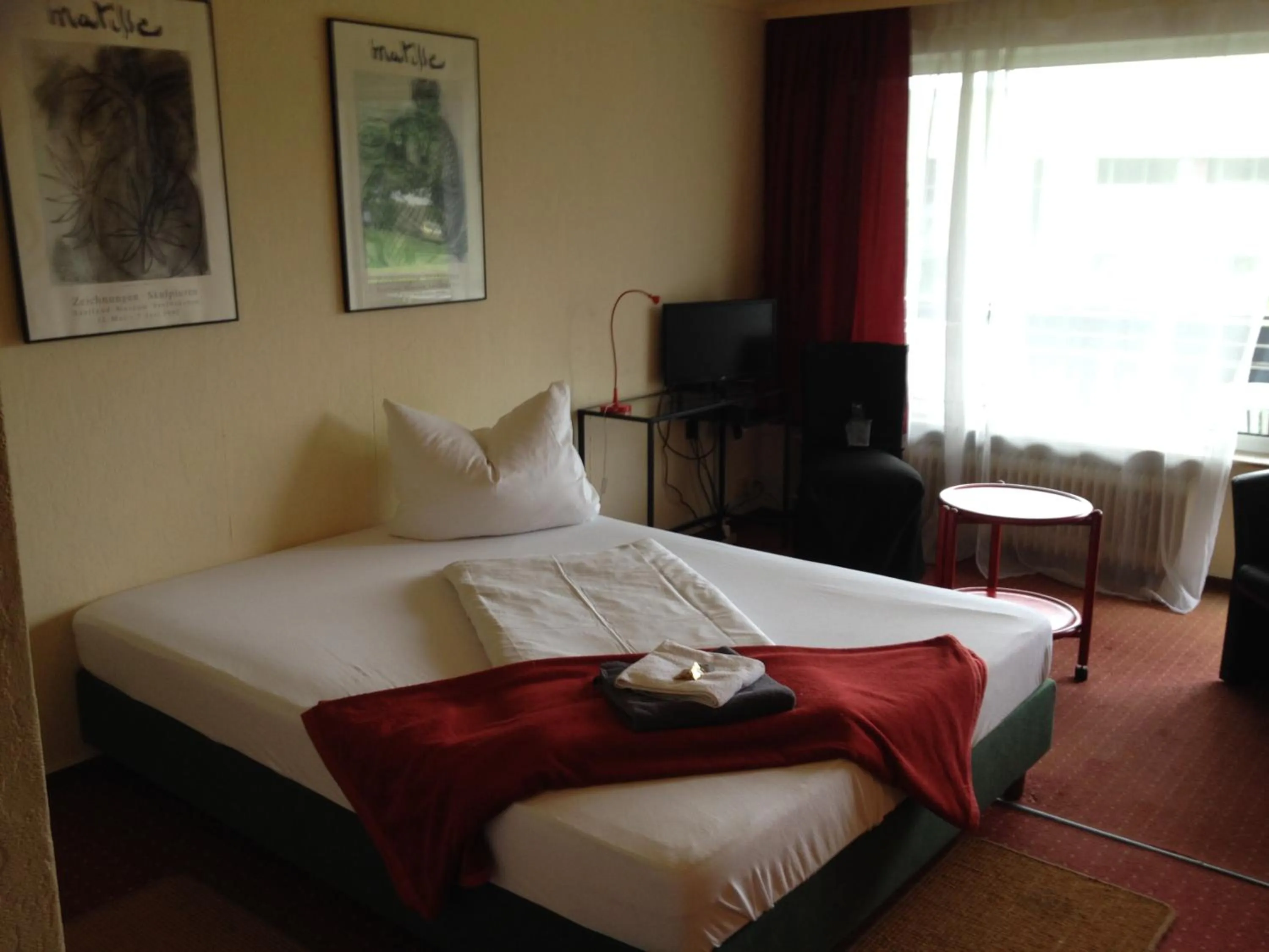 Photo of the whole room, Bed in Hotel Saarland Lebach