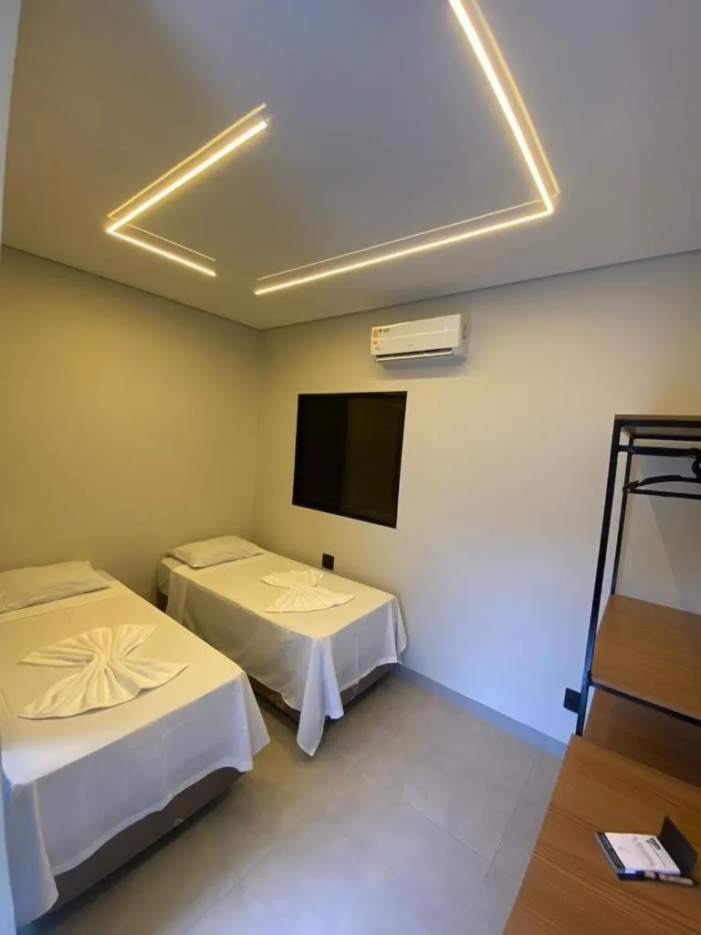 Bed in Village Prime Hotel