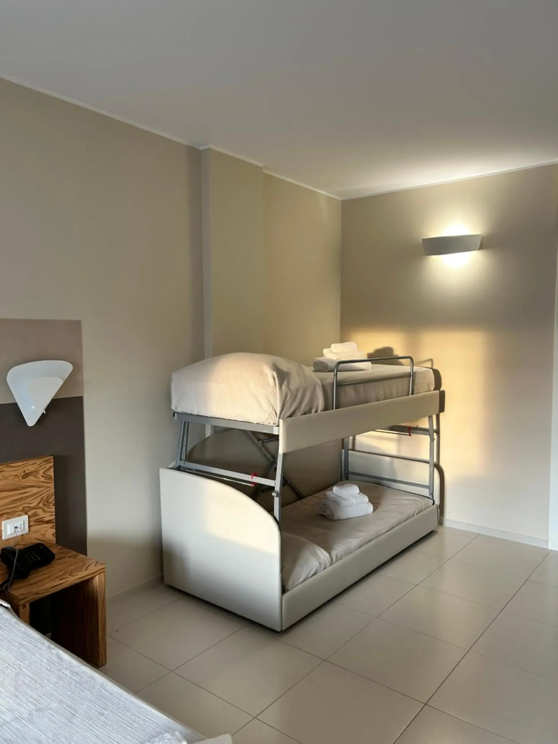 Quadruple Room with Sea View in Hotel la Spiaggia Quadruple Room with Sea View in Hotel la Spiaggia