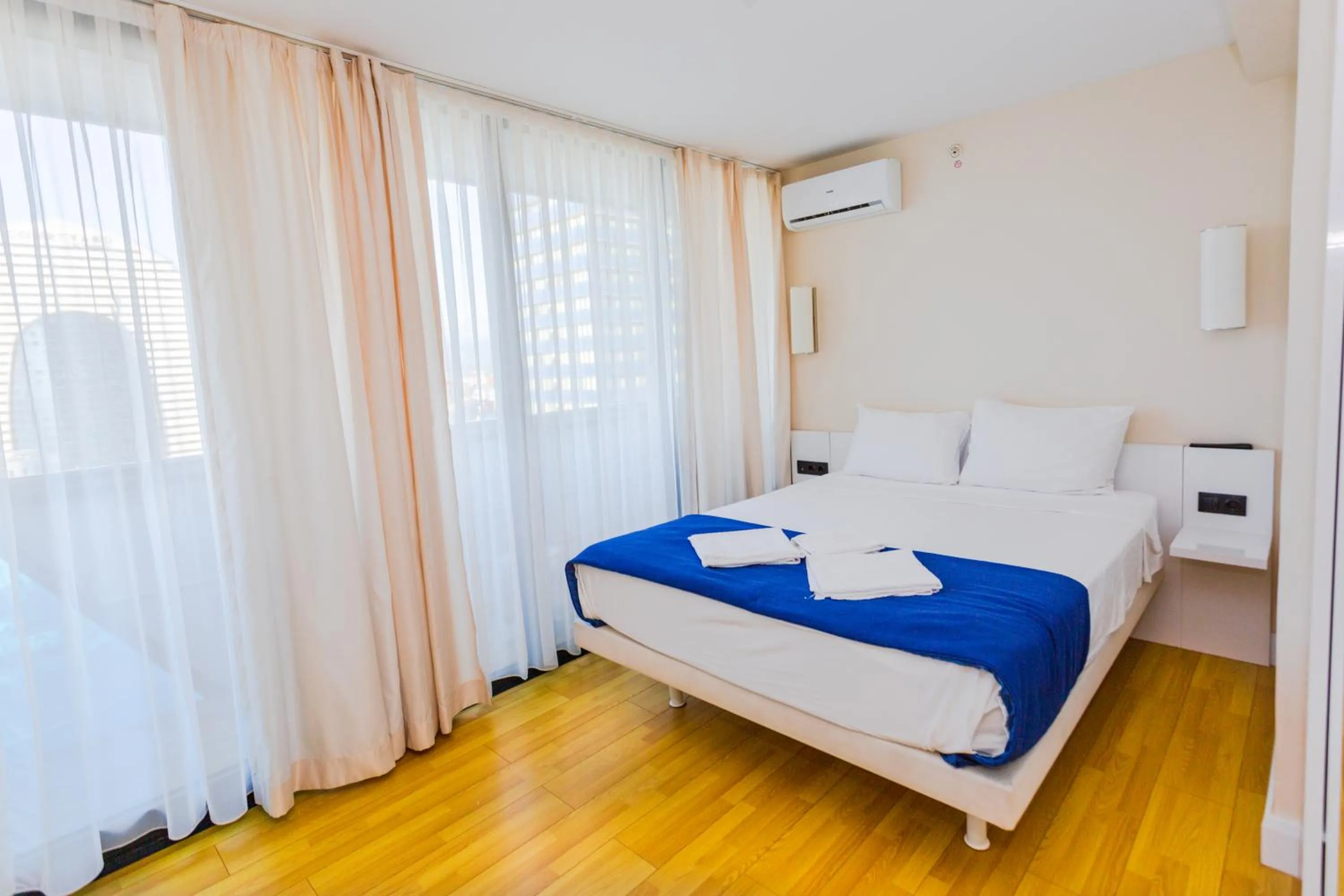 Bed in Orbi City Hotel