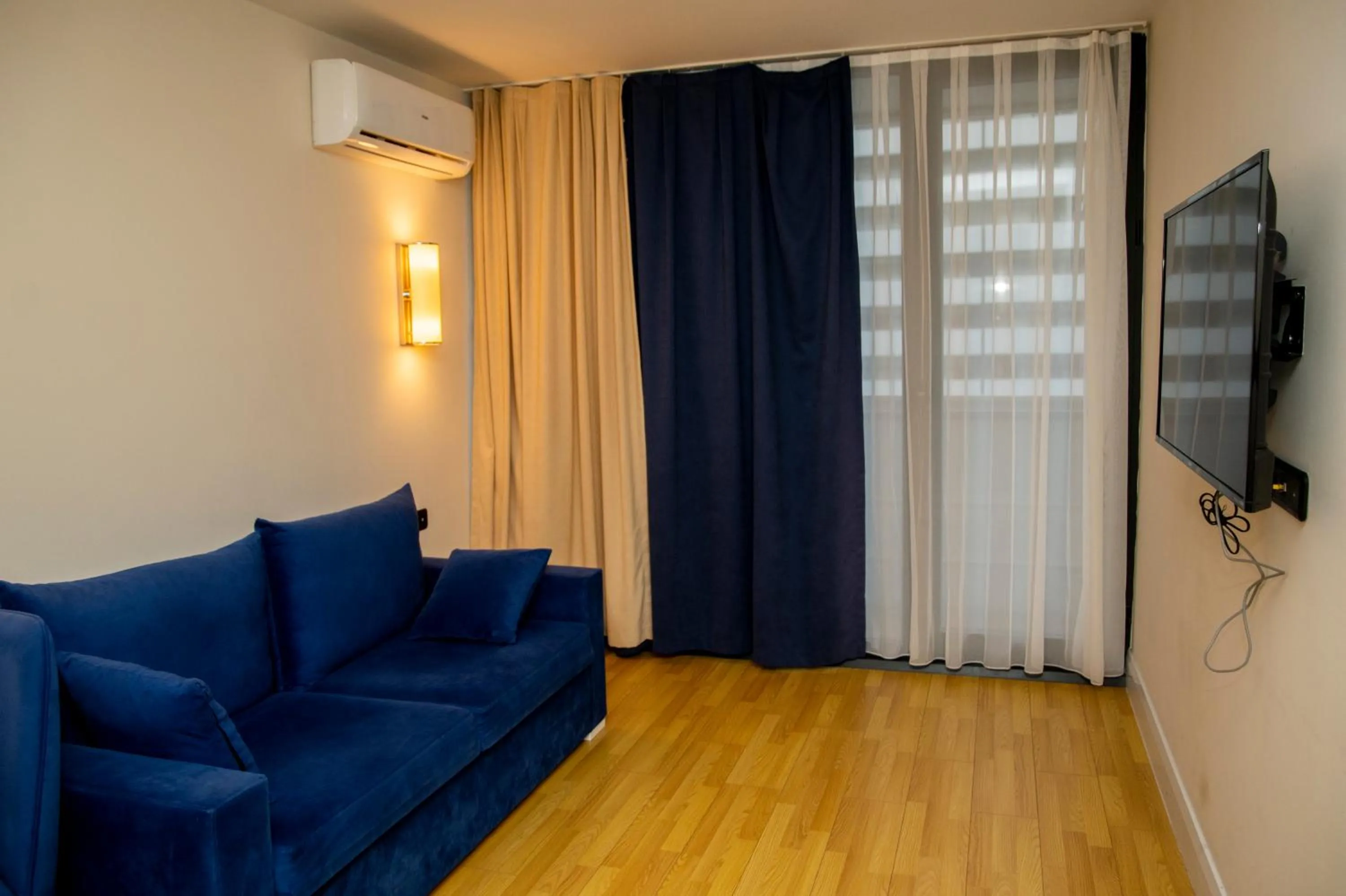 Communal lounge/ TV room in Orbi City Hotel