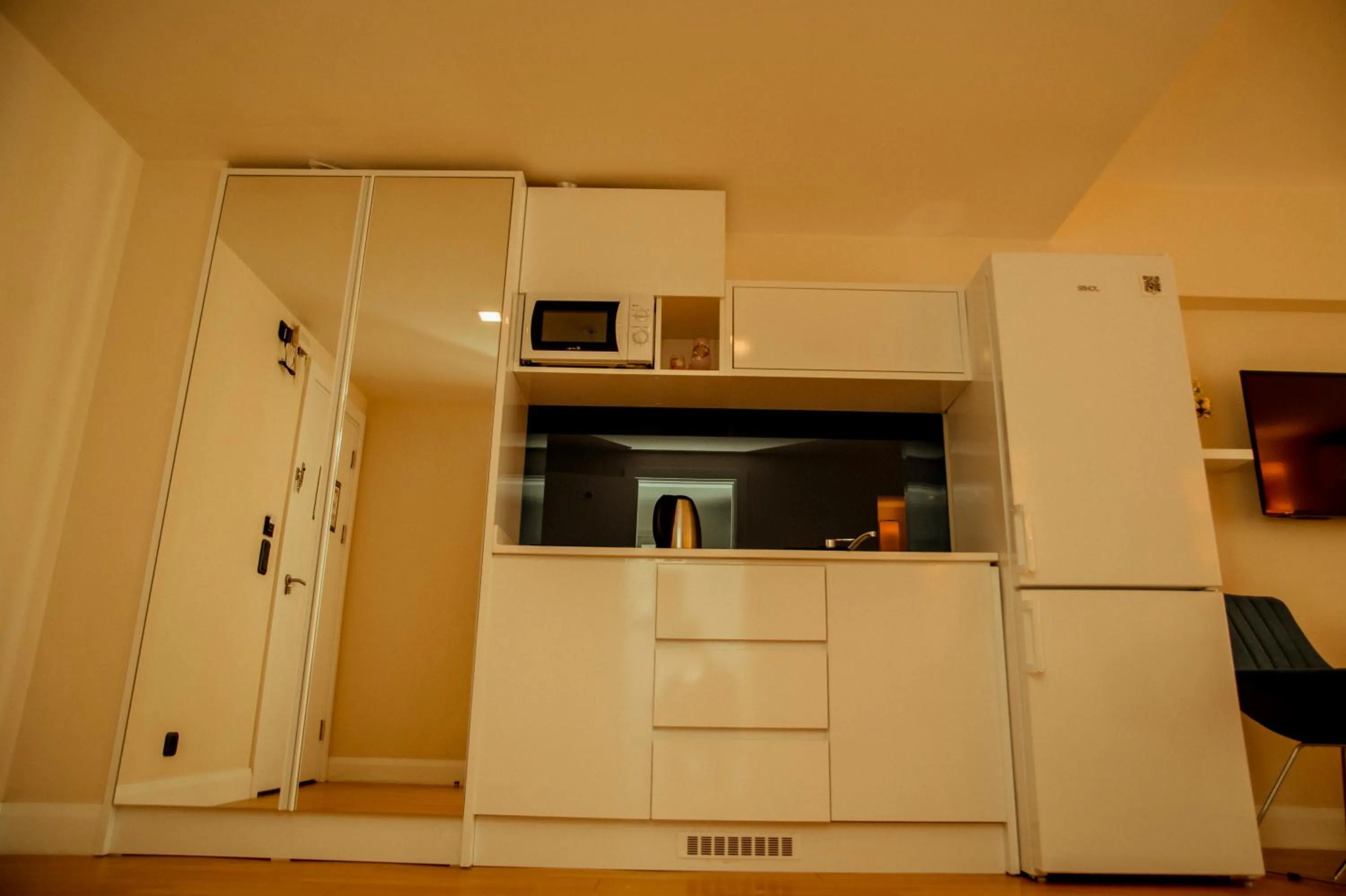 Kitchen or kitchenette in Orbi City Hotel
