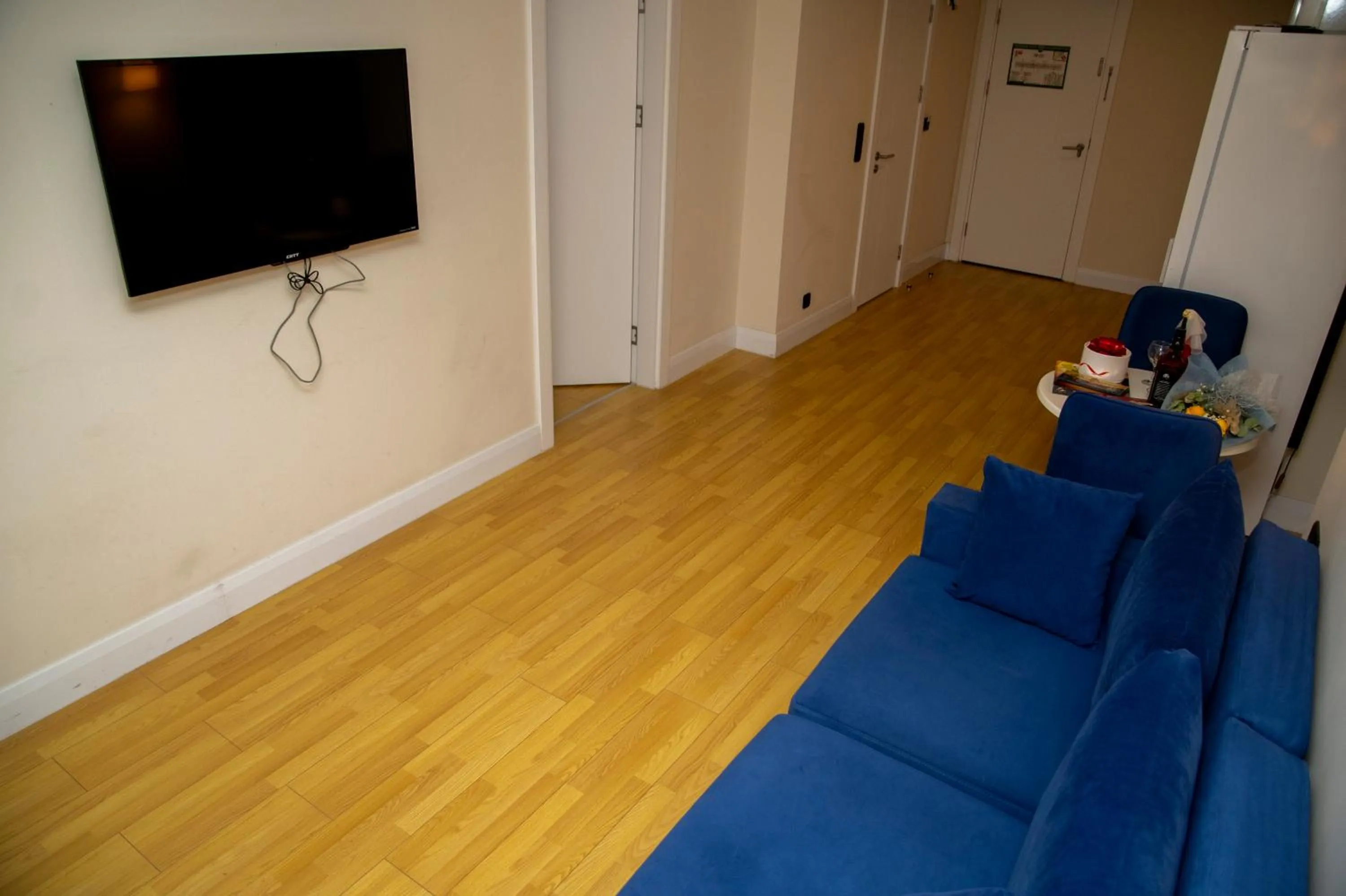 Communal lounge/ TV room in Orbi City Hotel