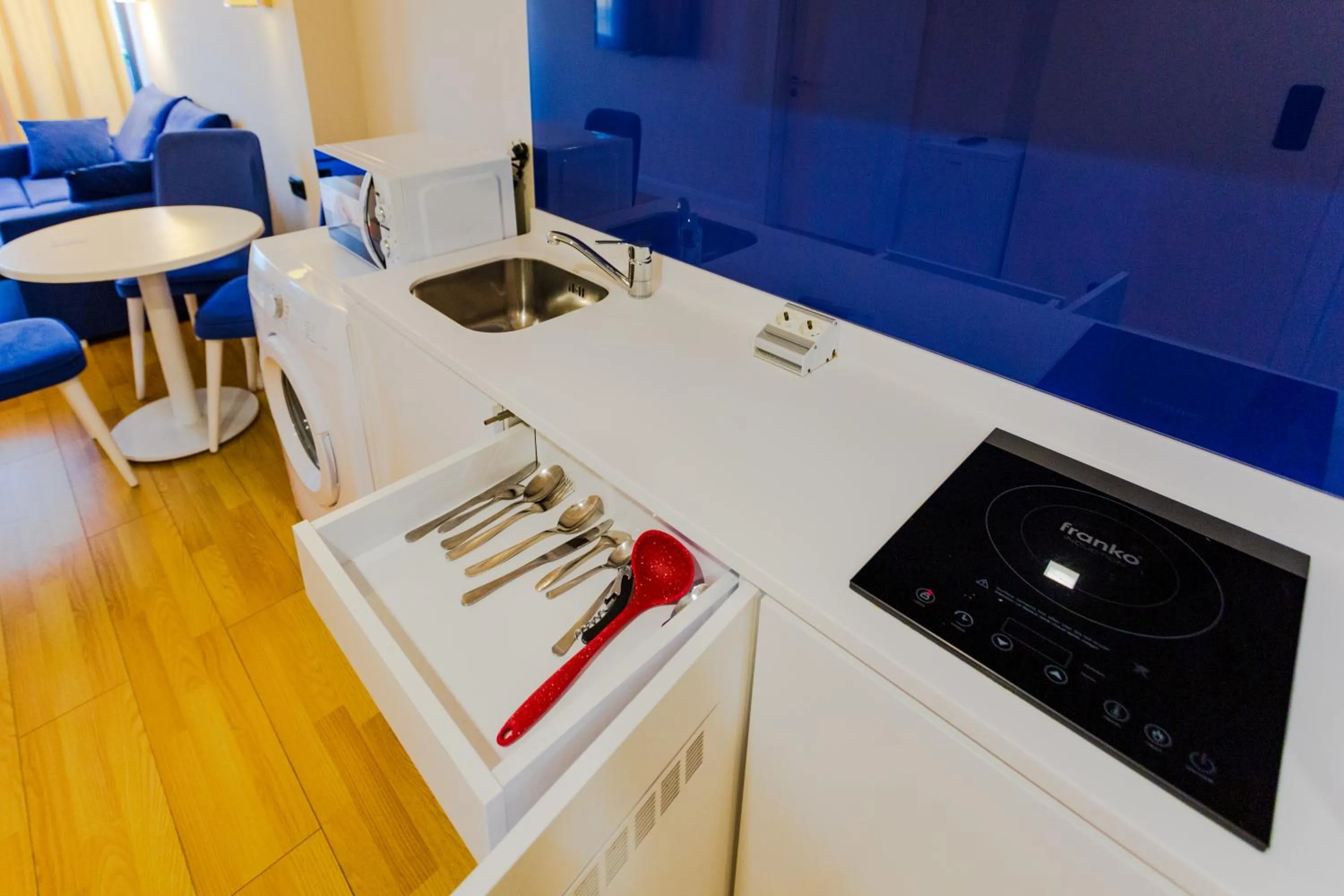 Kitchen or kitchenette in Orbi City Hotel