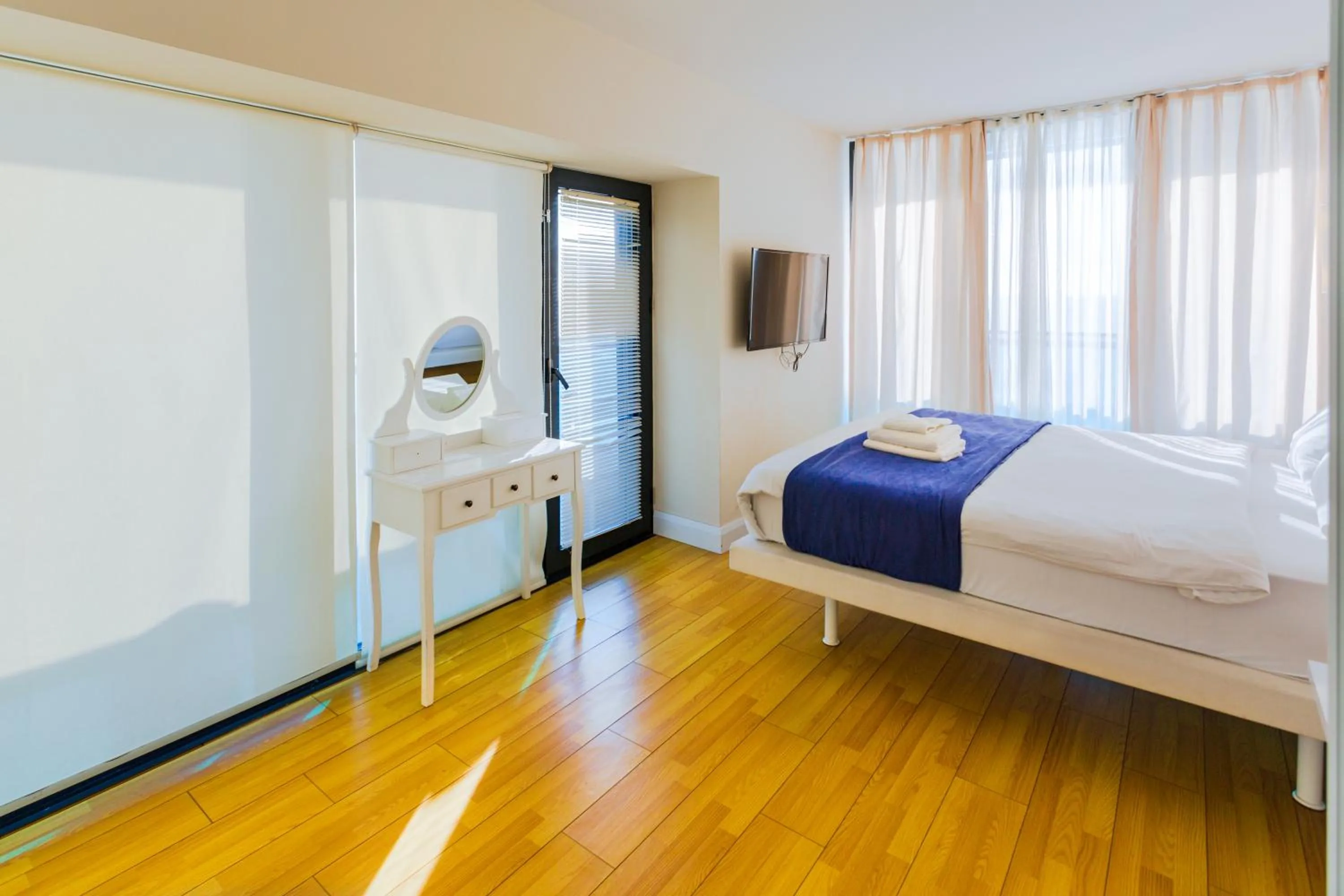 Bed in Orbi City Hotel