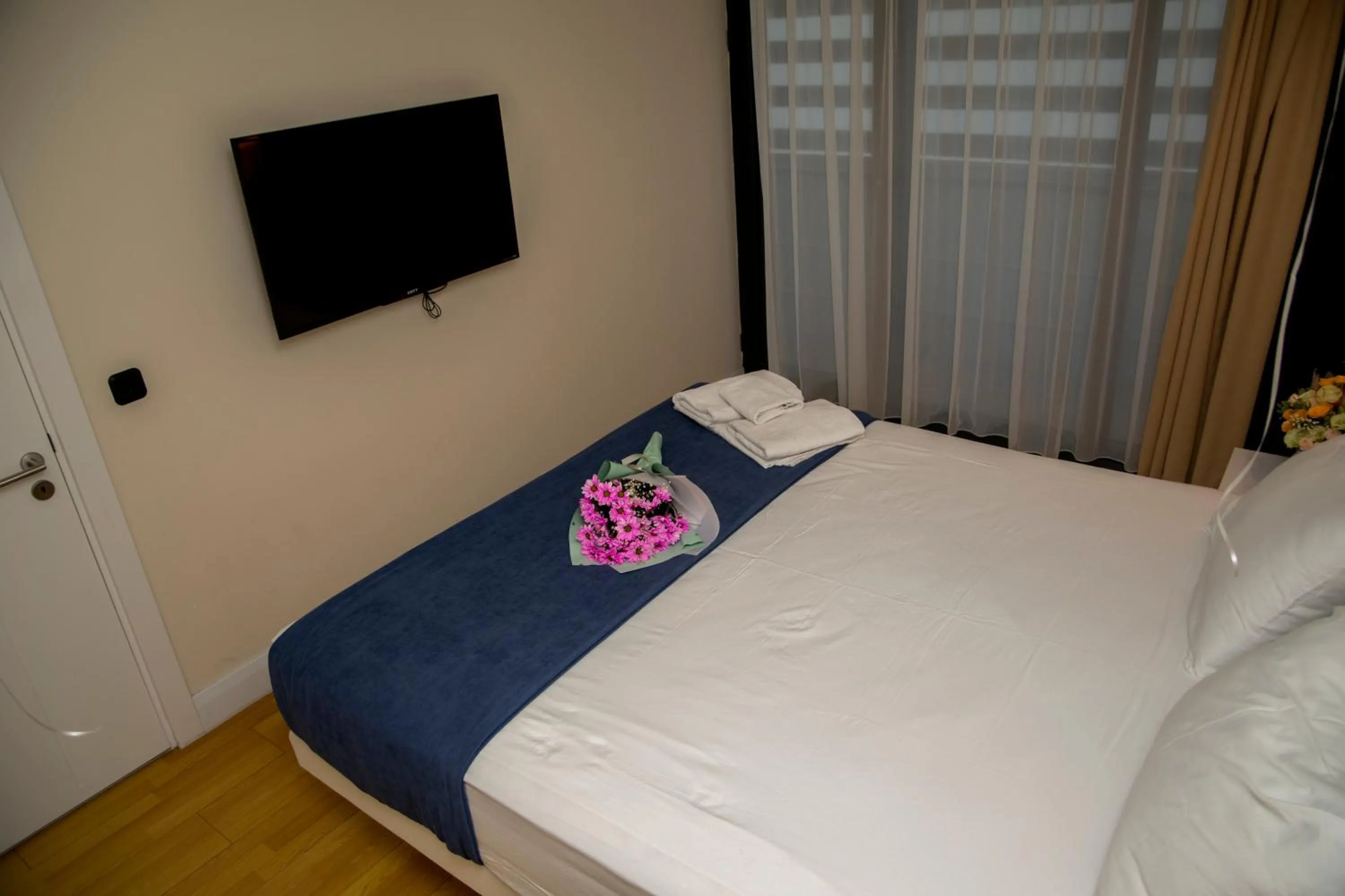 Bed in Orbi City Hotel