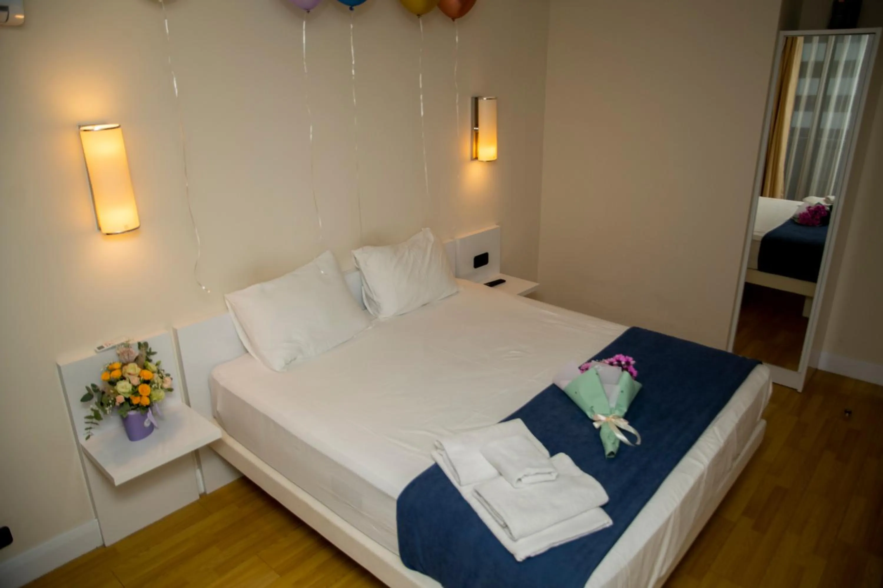 Bed in Orbi City Hotel