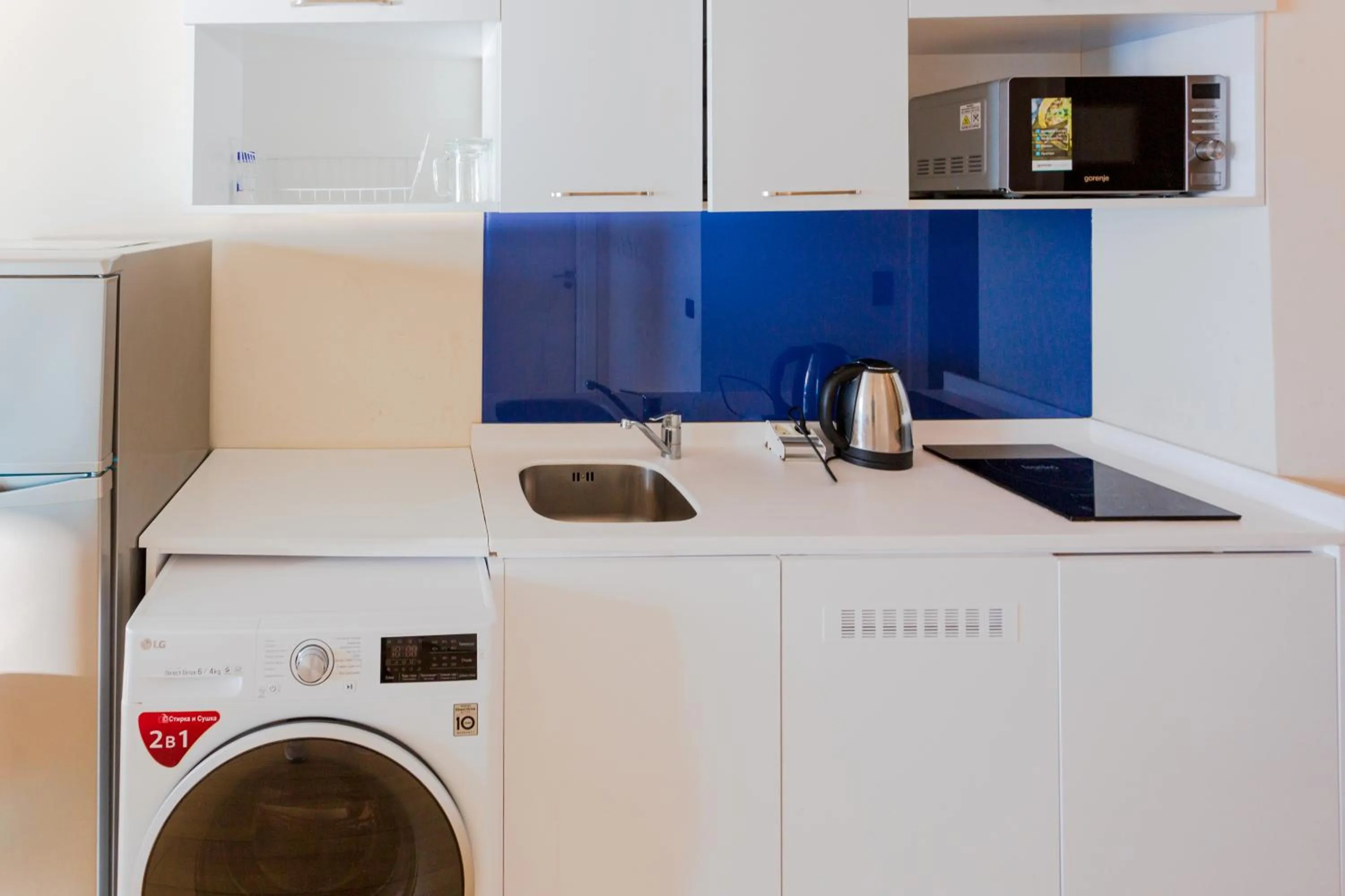 Kitchen or kitchenette in Orbi City Hotel