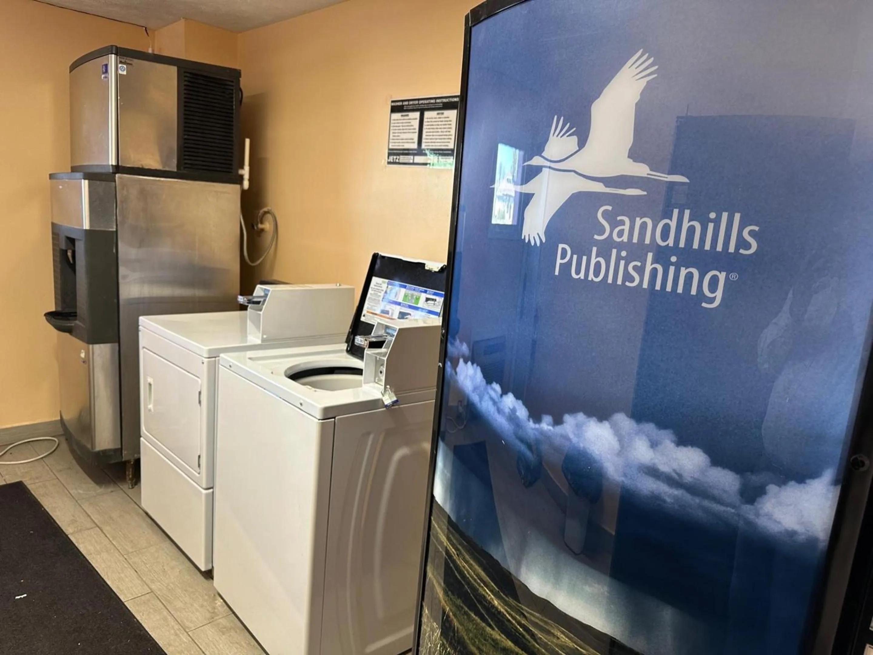 washing machine in Stay Inn by OYO Near I 80 Lincoln West