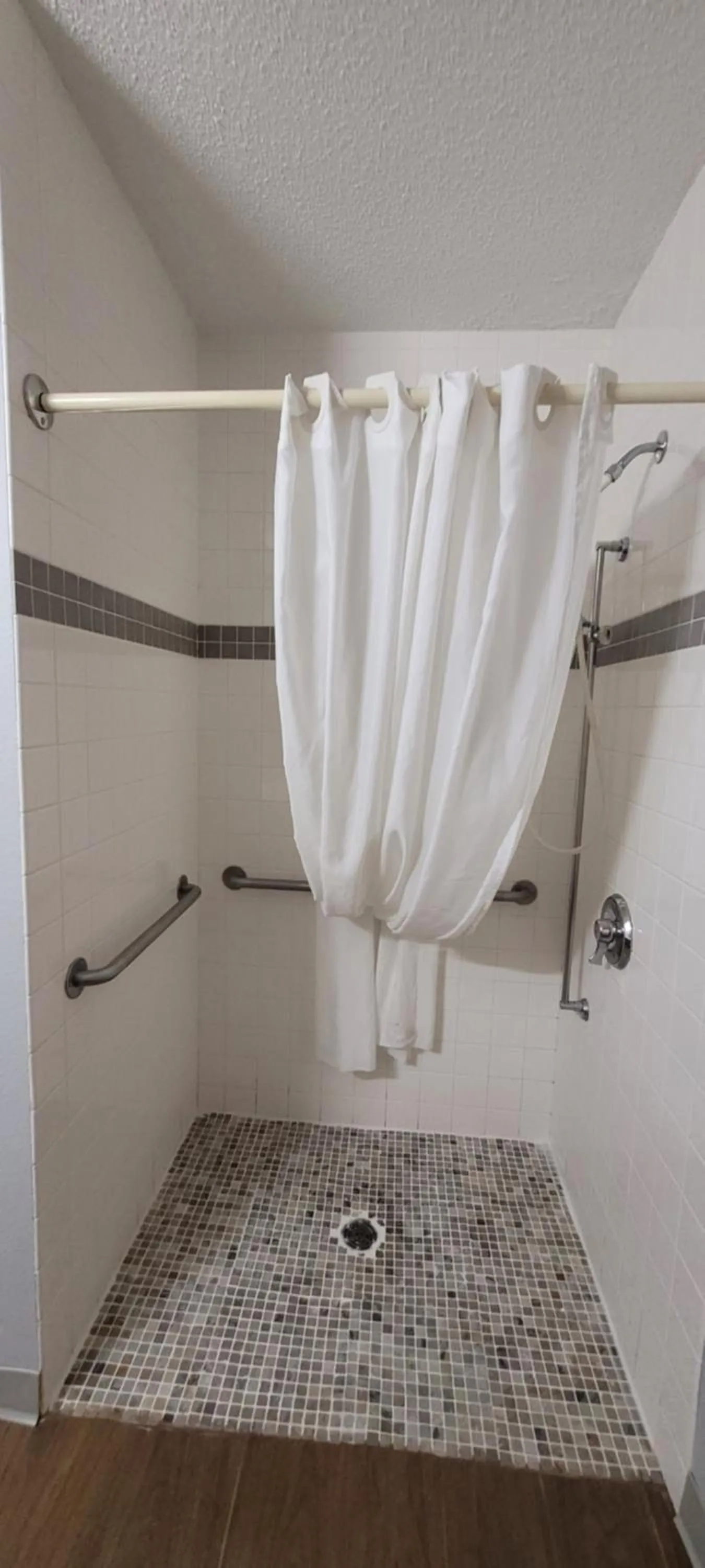 Shower in Days Inn & Suites by Wyndham Williamsburg IA North