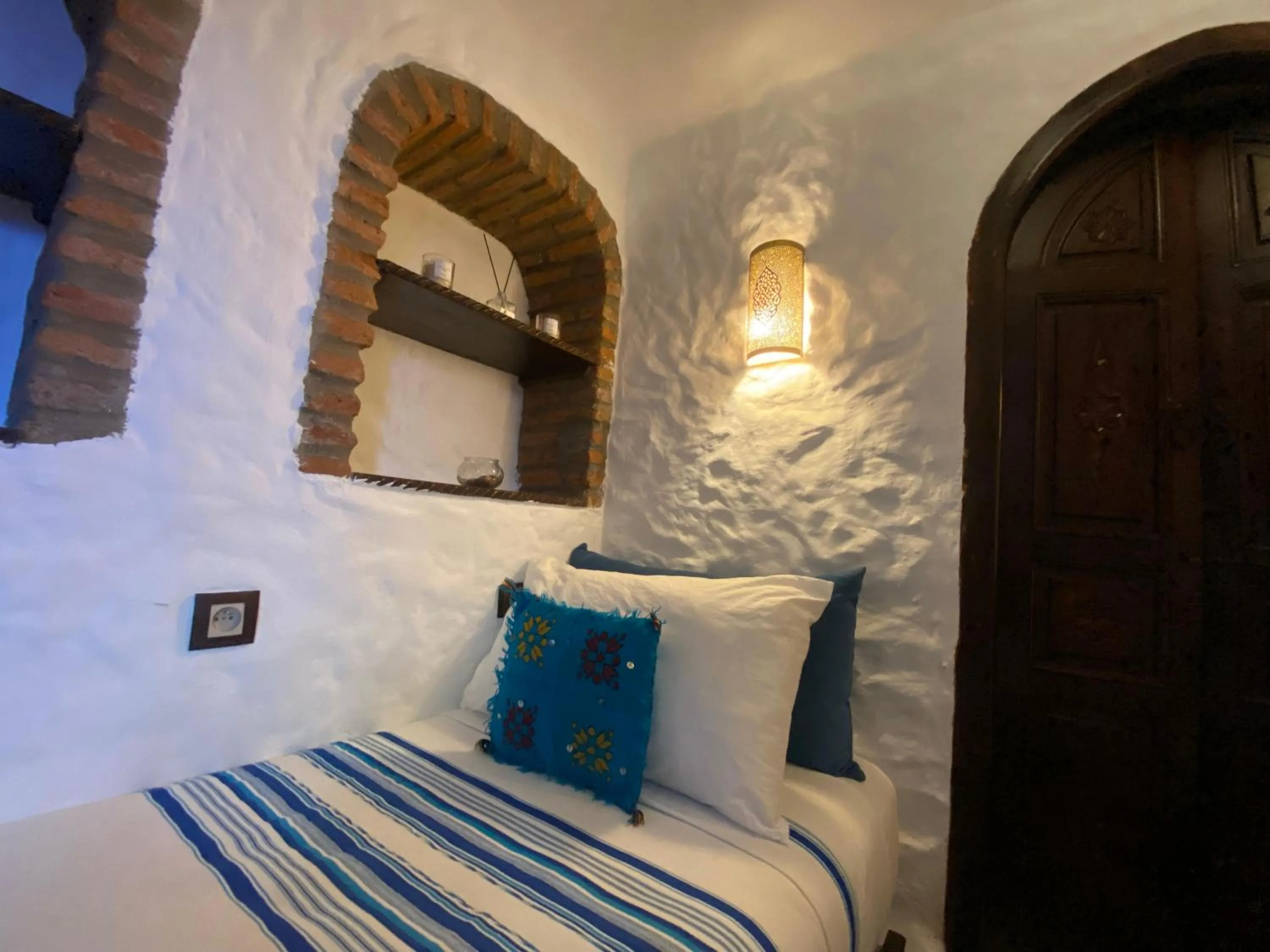 Bed in Riad Gharnata
