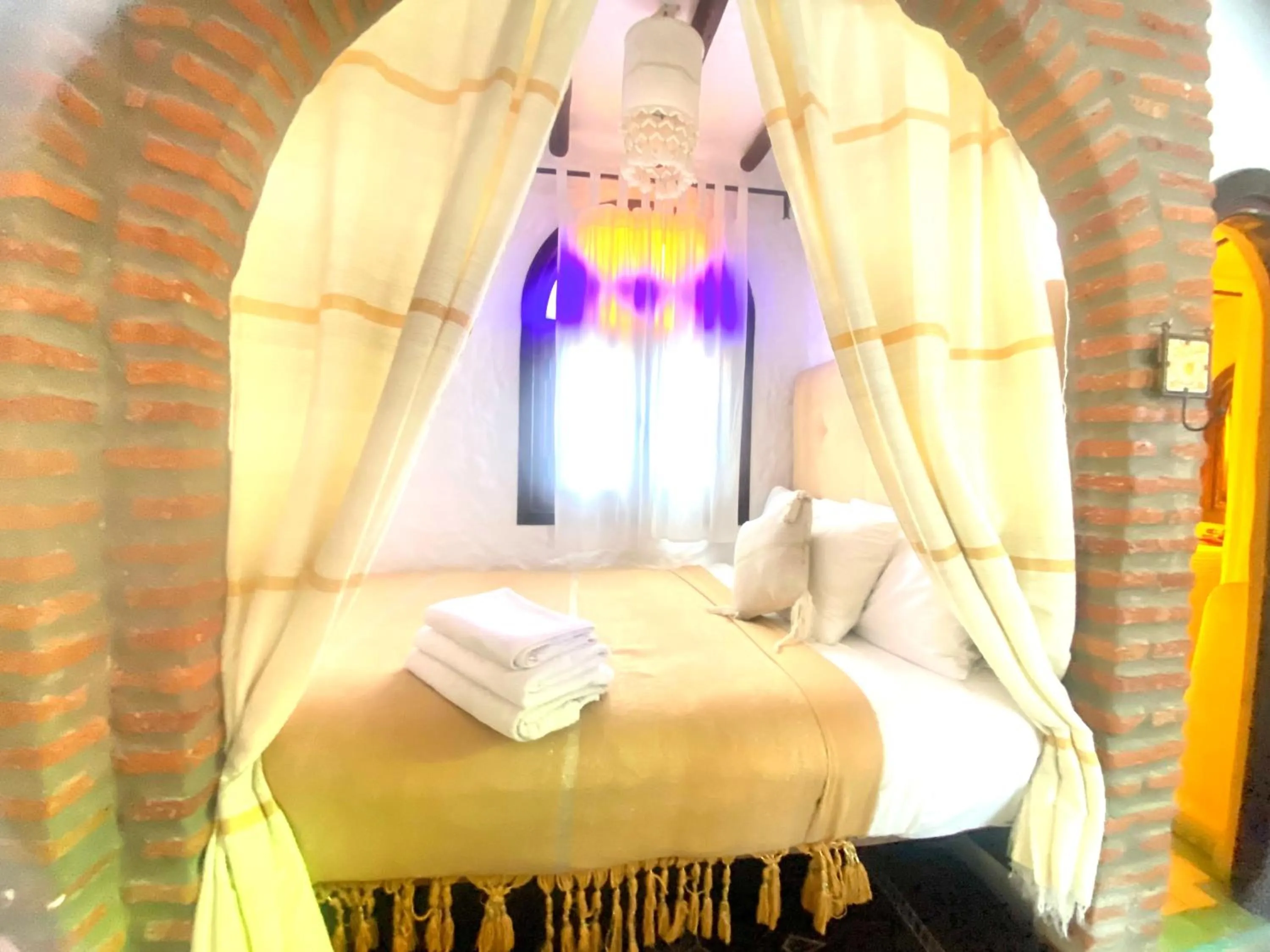 Bed in Riad Gharnata
