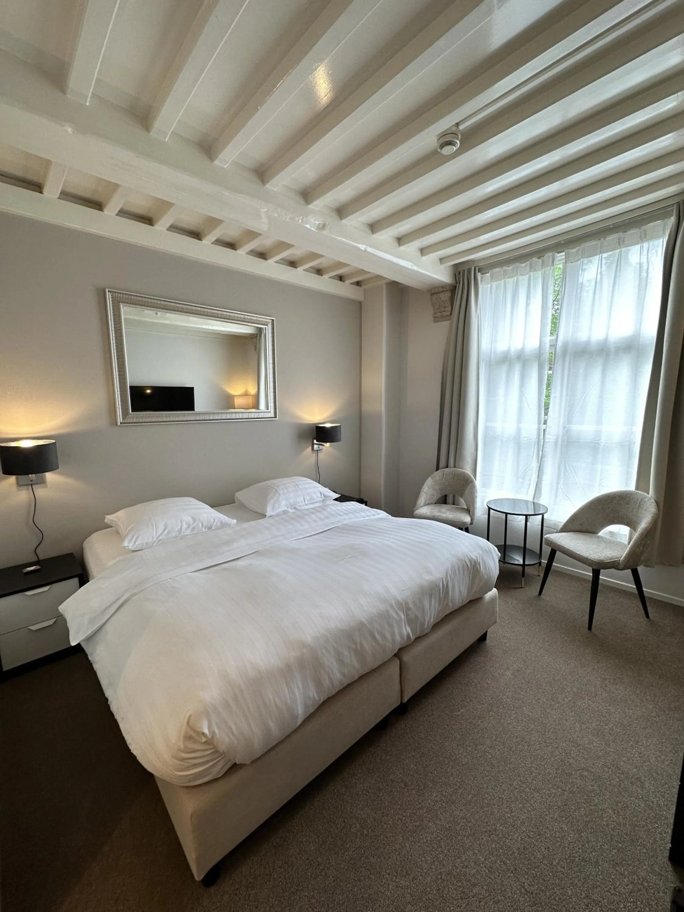 Bed in Hotel Grand Canal