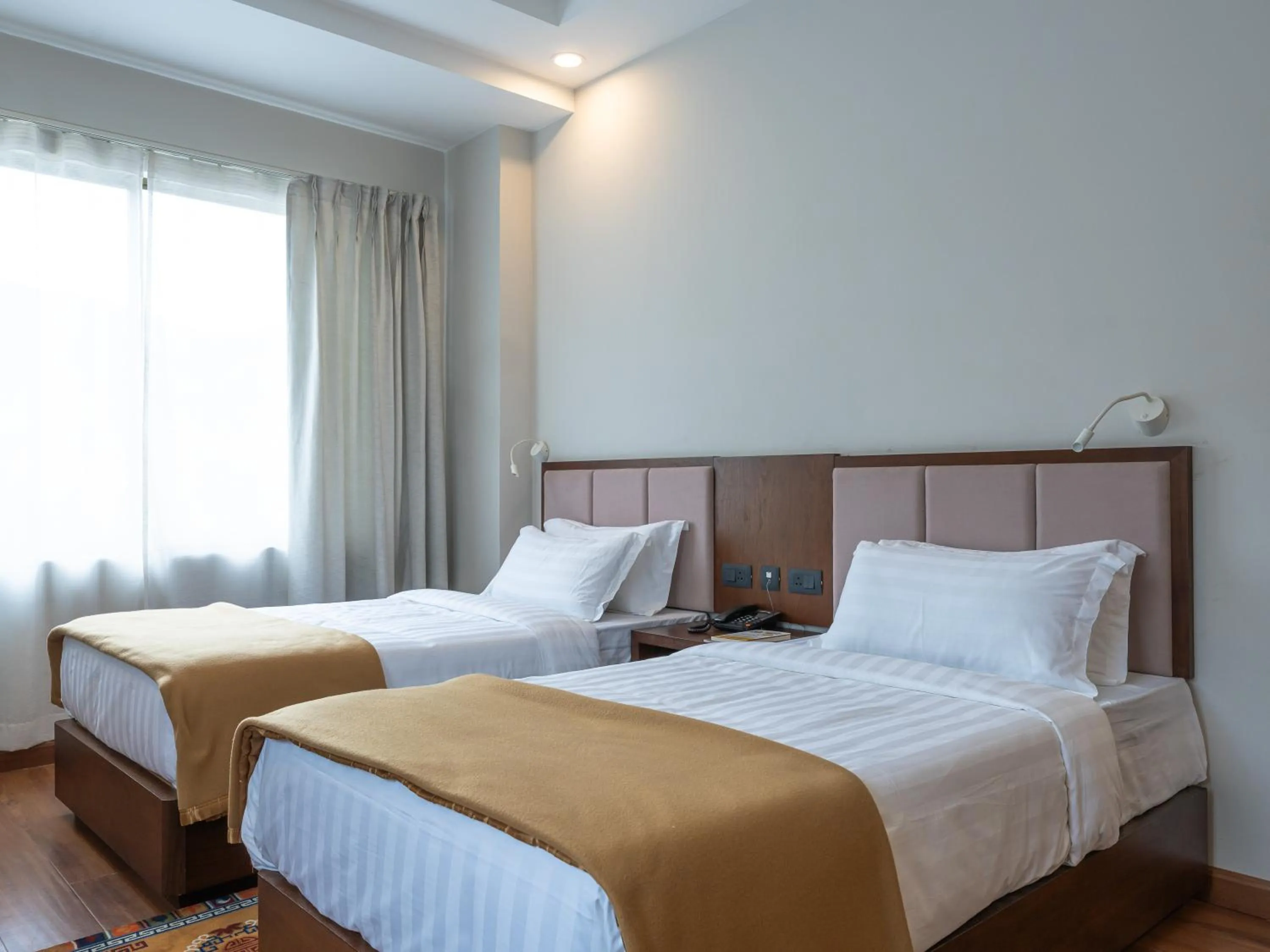 Property building, Bed in Hotel Samye - Best Hotel In Thimphu