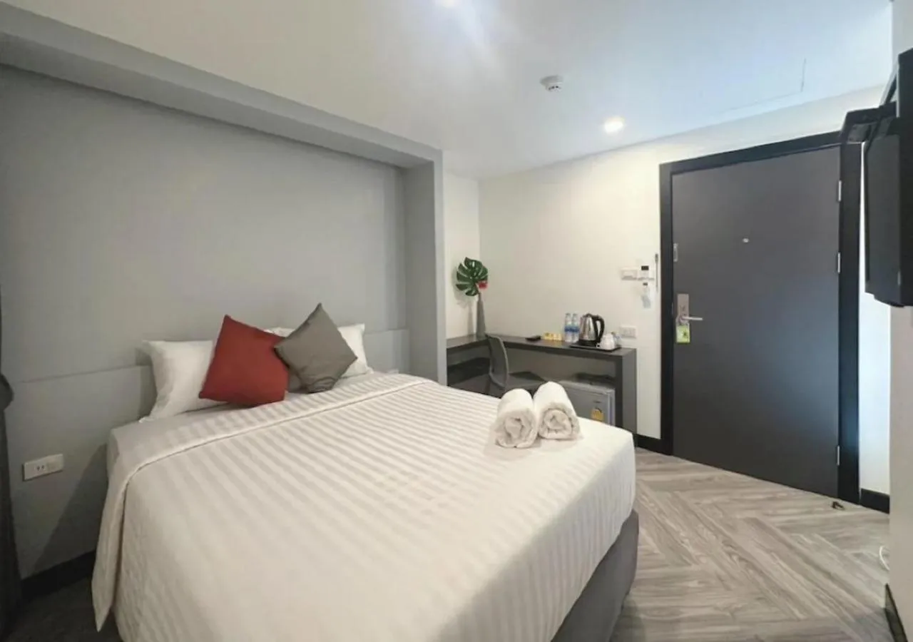 Bed in 14 Sathorn Hotel