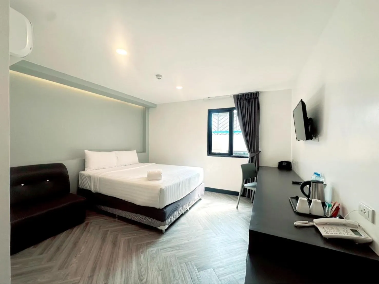 Bed in 14 Sathorn Hotel