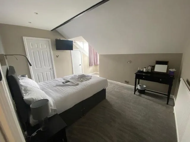 Bed in The Lowther Hotel