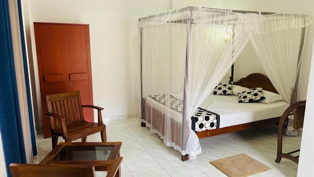 Bed in Sunny Mood Guest House