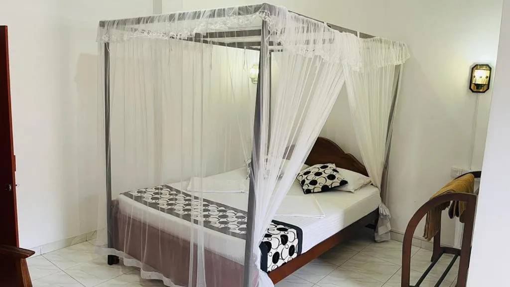 Bed in Sunny Mood Guest House
