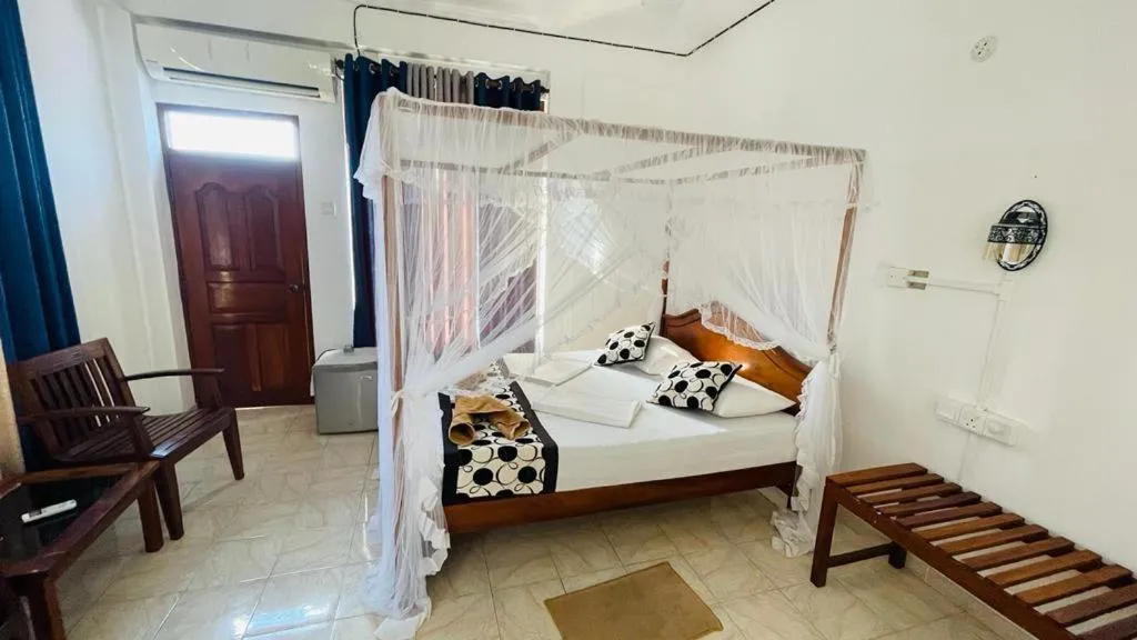 Bed in Sunny Mood Guest House