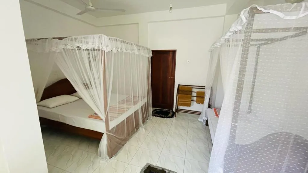 Bed in Sunny Mood Guest House