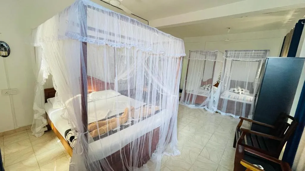 Bed in Sunny Mood Guest House