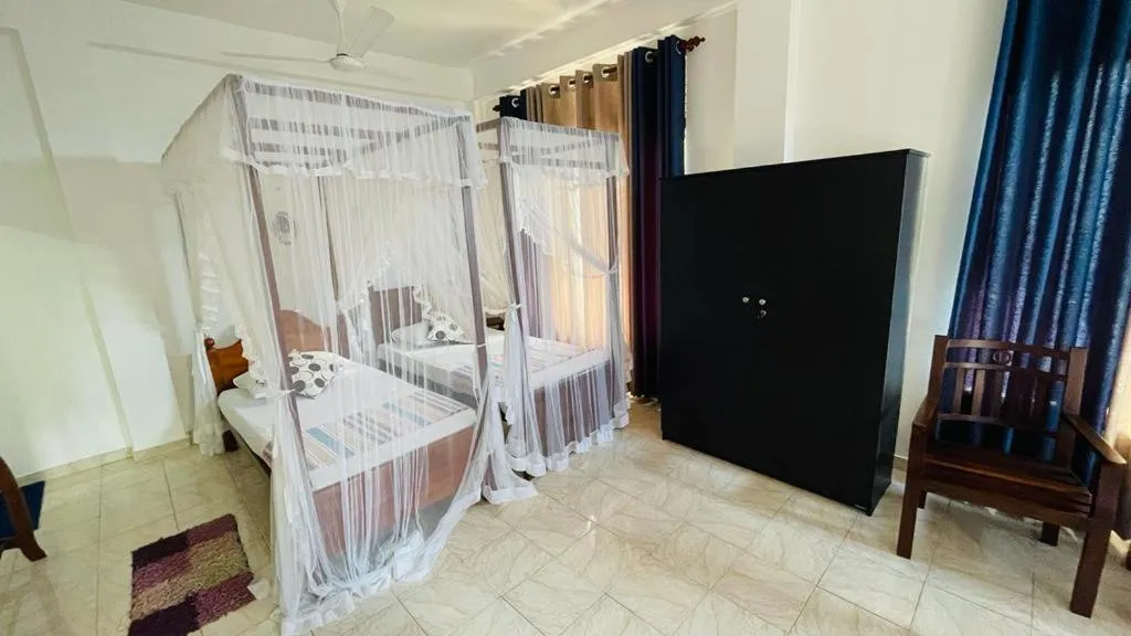 Bed in Sunny Mood Guest House