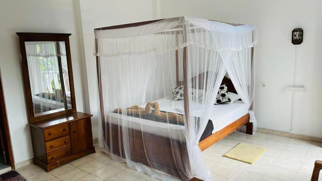 Bed in Sunny Mood Guest House