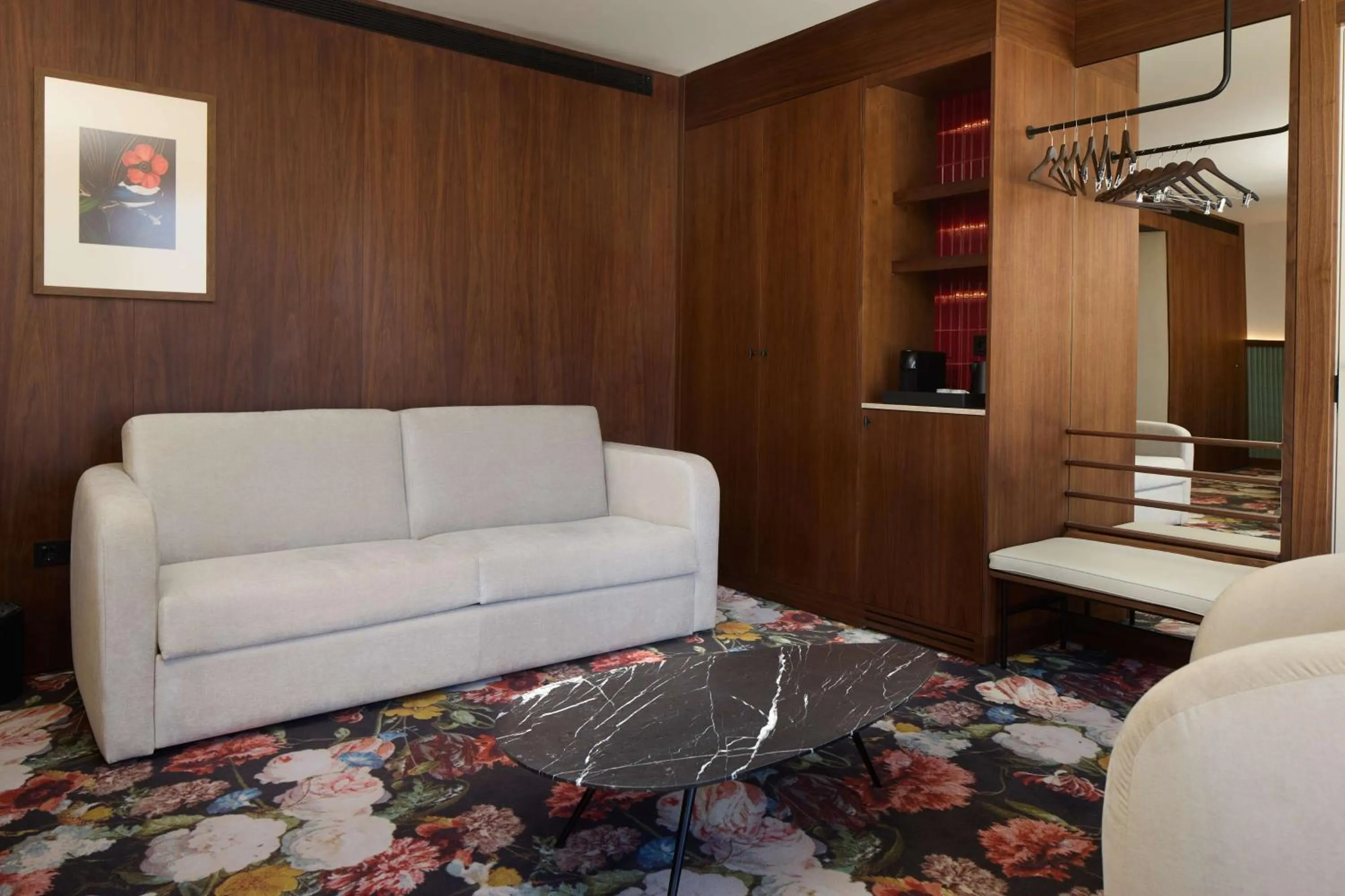 Living room in DUO Hotel Lisbon, Curio Collection by Hilton