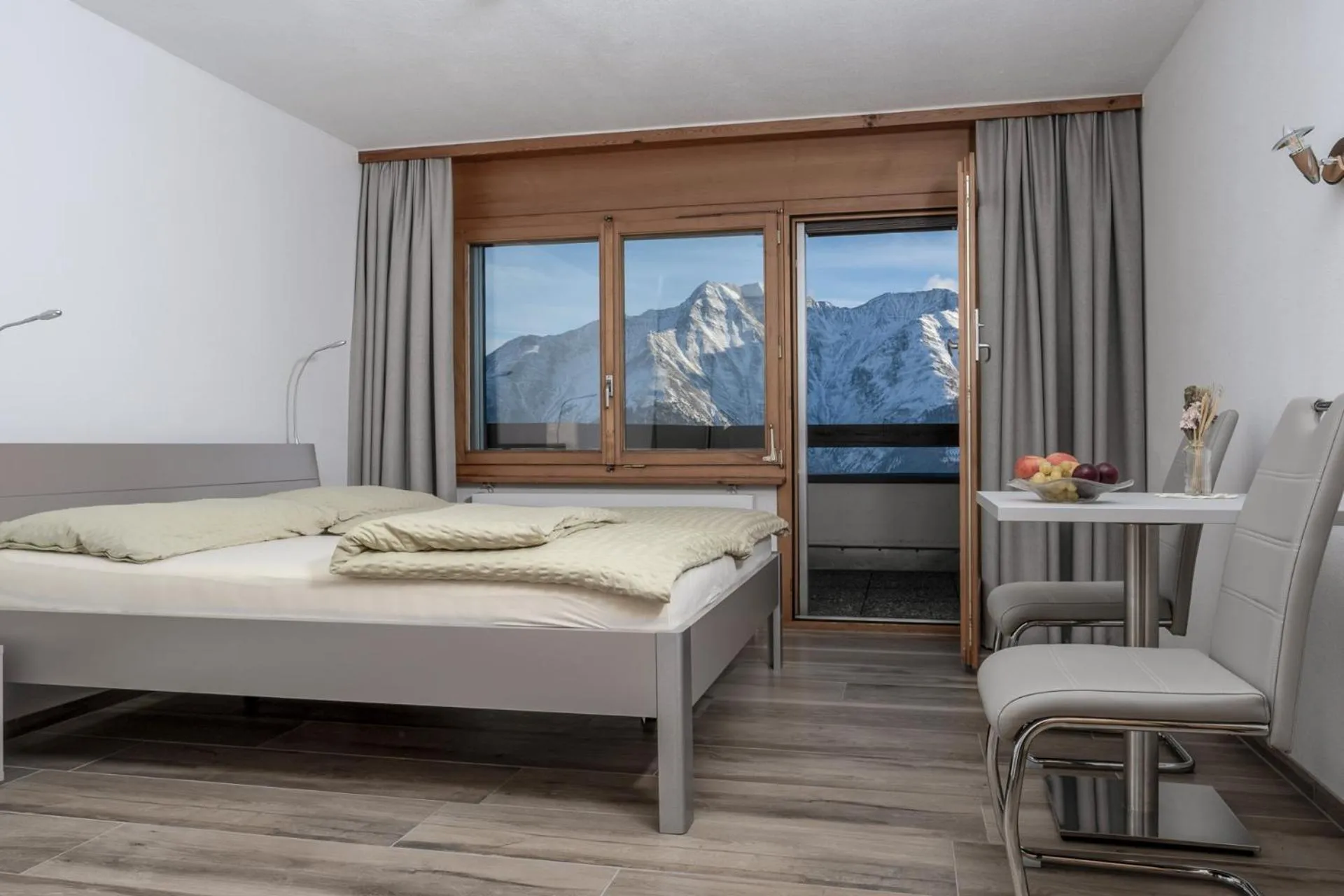 Seating area, Bed in Ferienwohnungen Zurschmitten