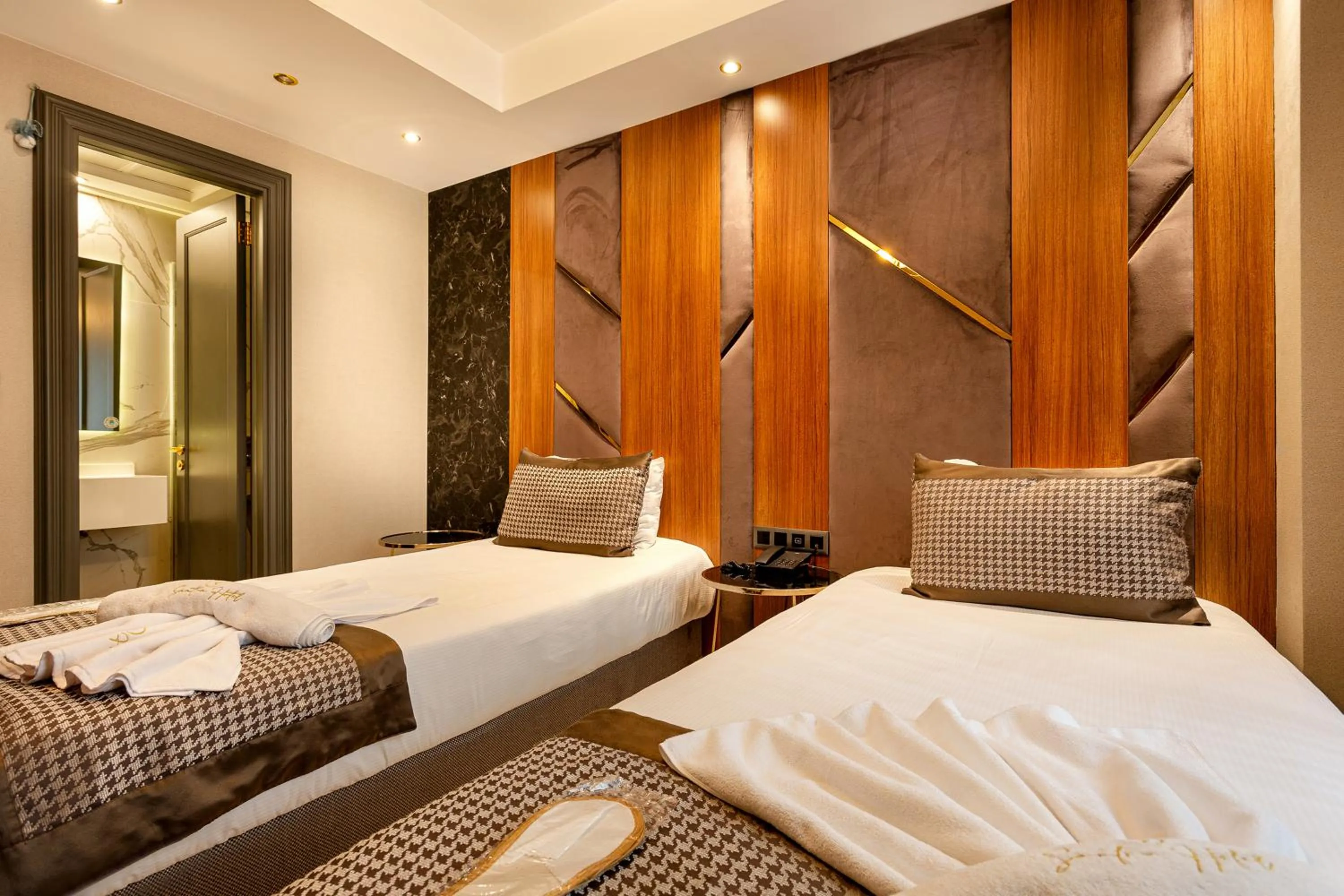 Bed in Santra Hotel