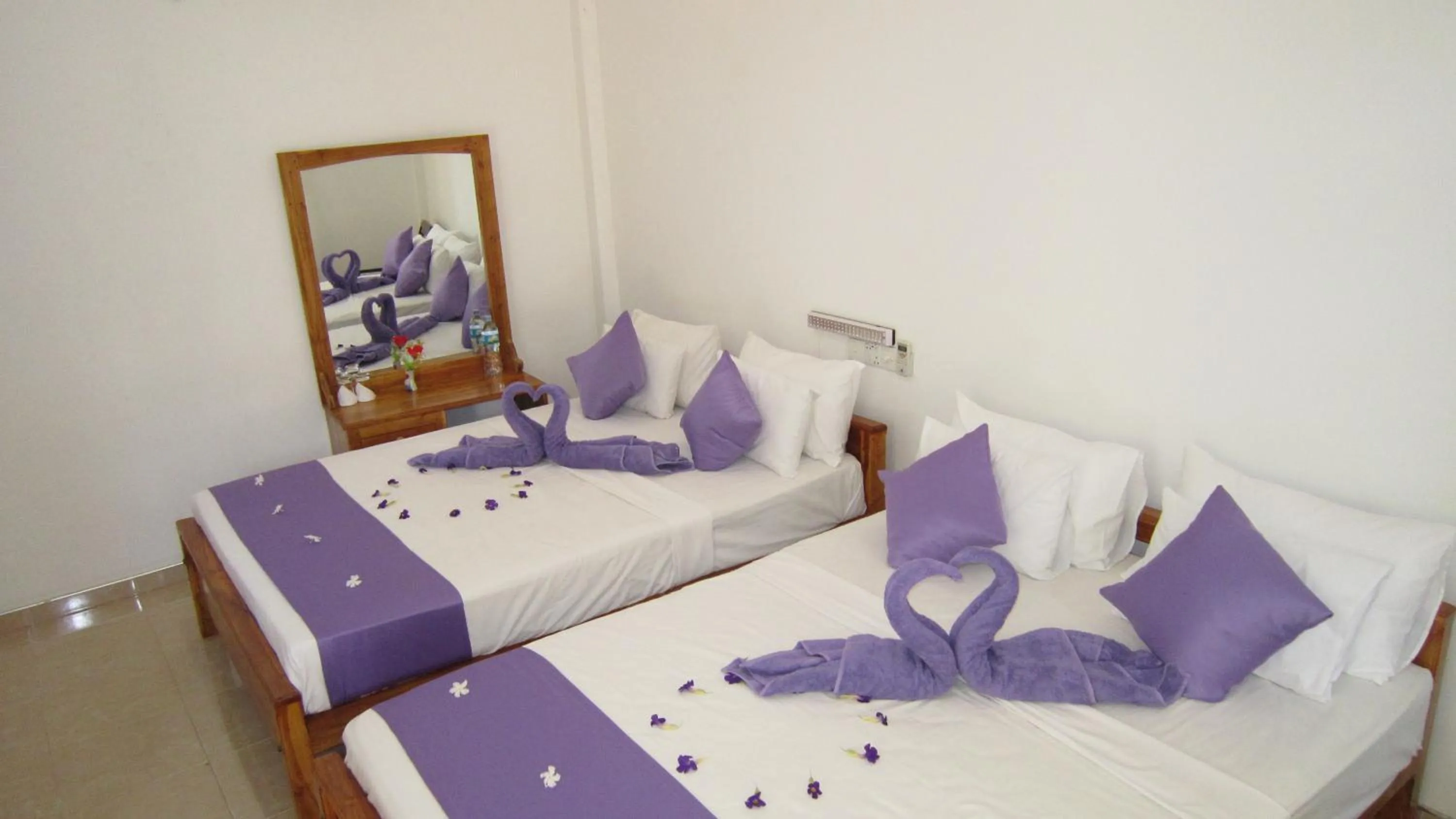 Bed in Hotel Gayan's