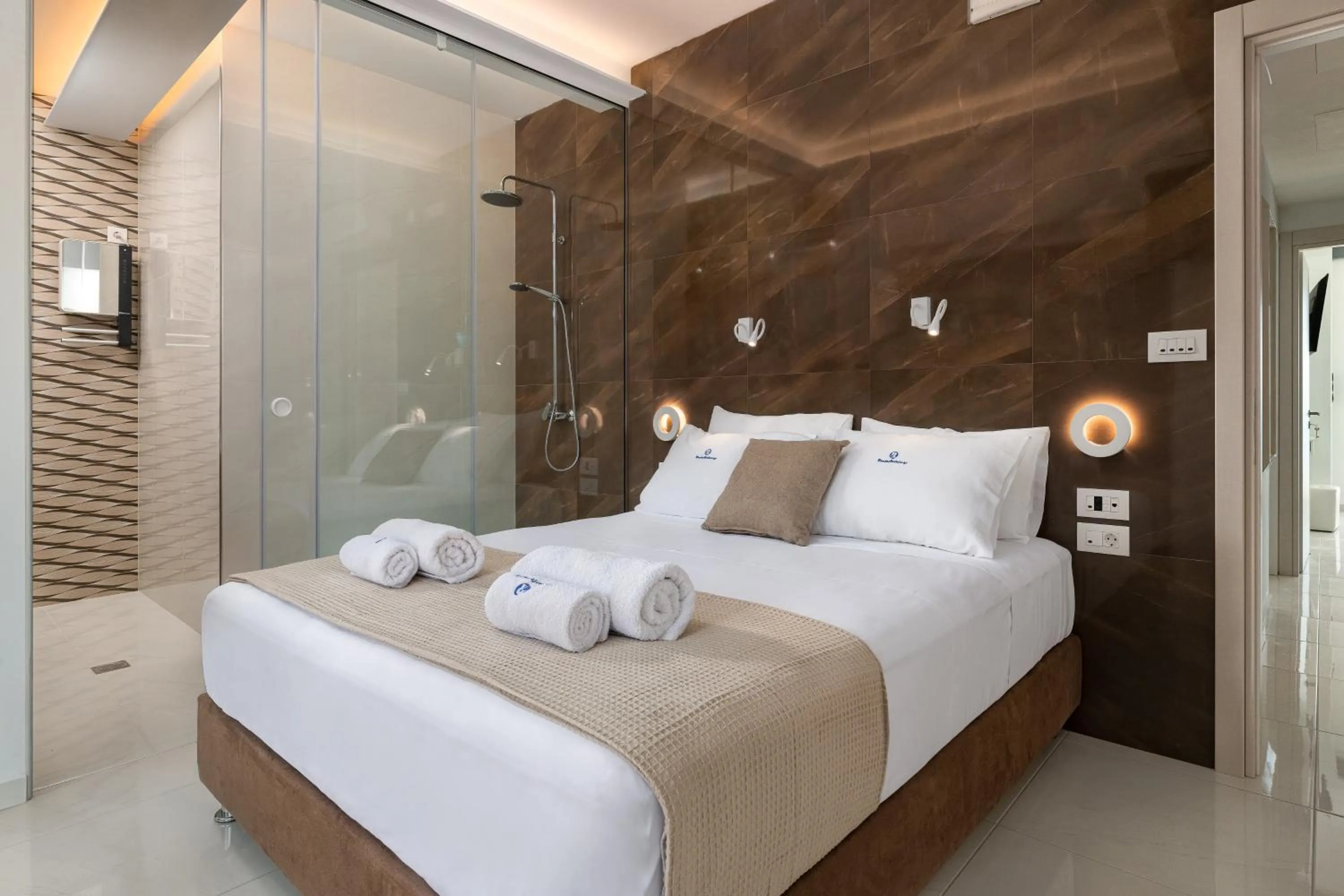 Shower, Bed in Rhodes Skyline Suite with out Door Jacuzzi Sea View A2