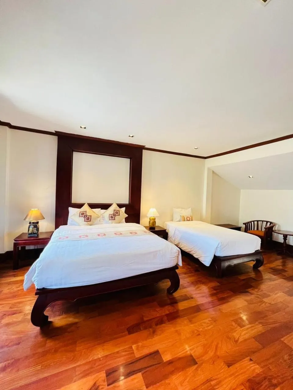 Bed in Houngvilai Hotel