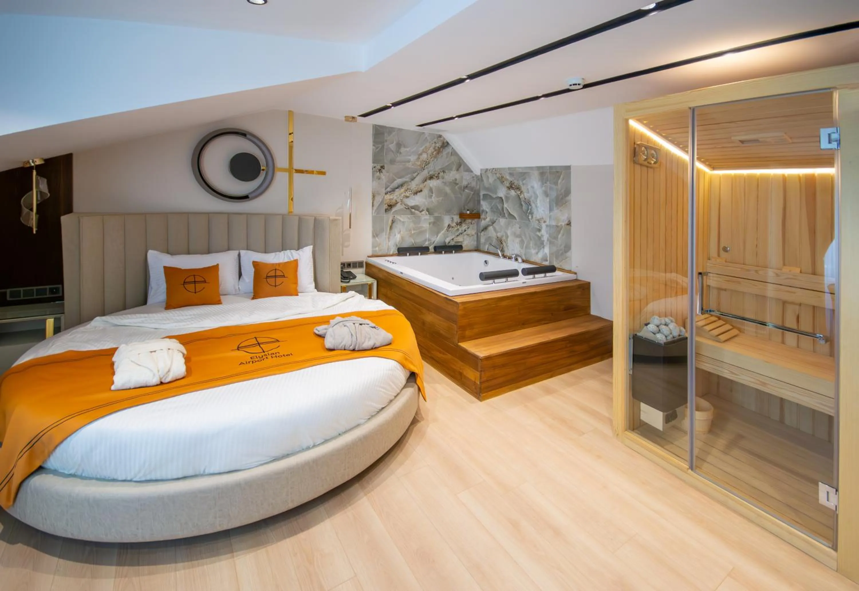 Bed in Elysian Airport Hotel & Restaurant