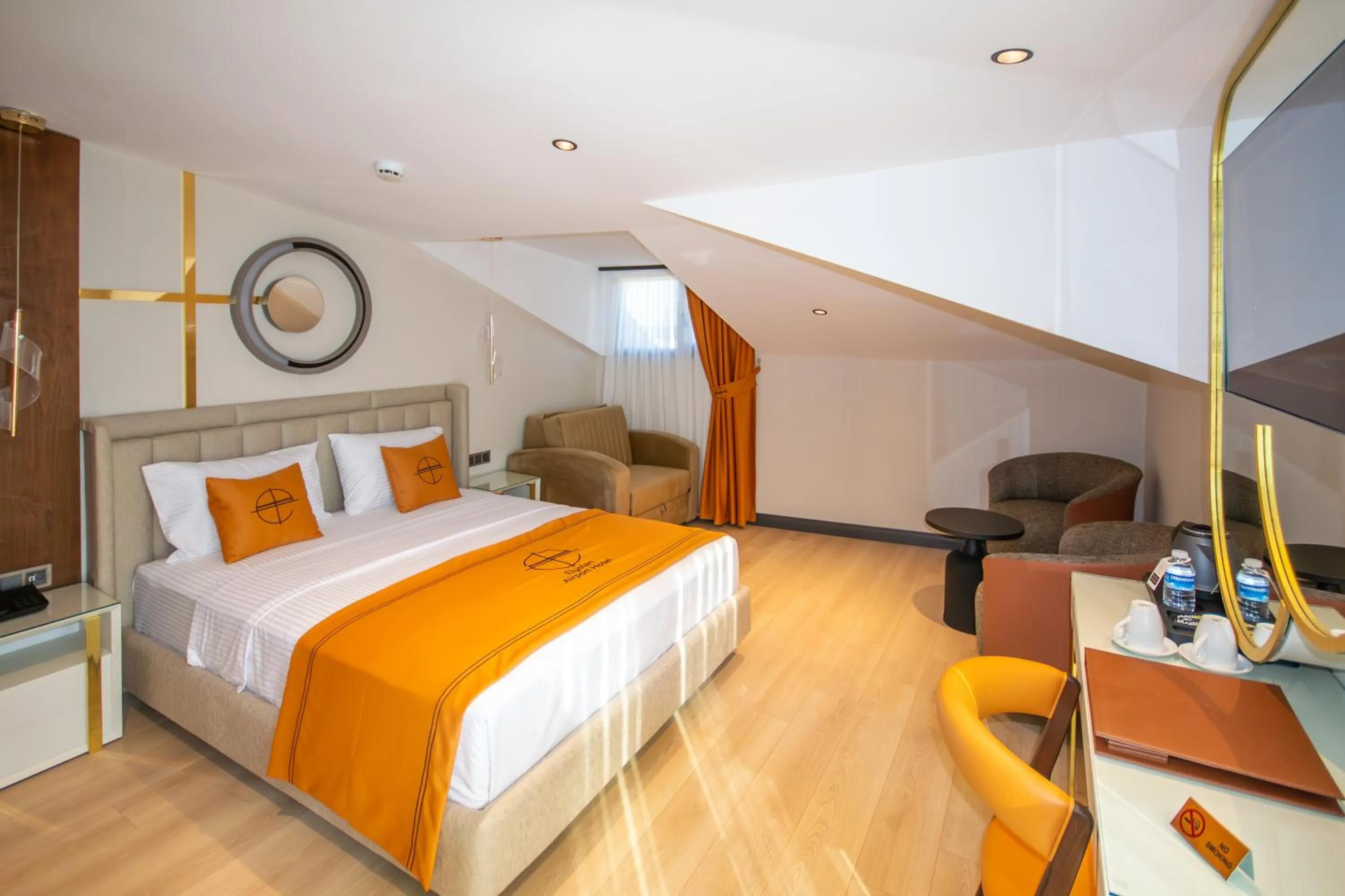 Bed in Elysian Airport Hotel & Restaurant