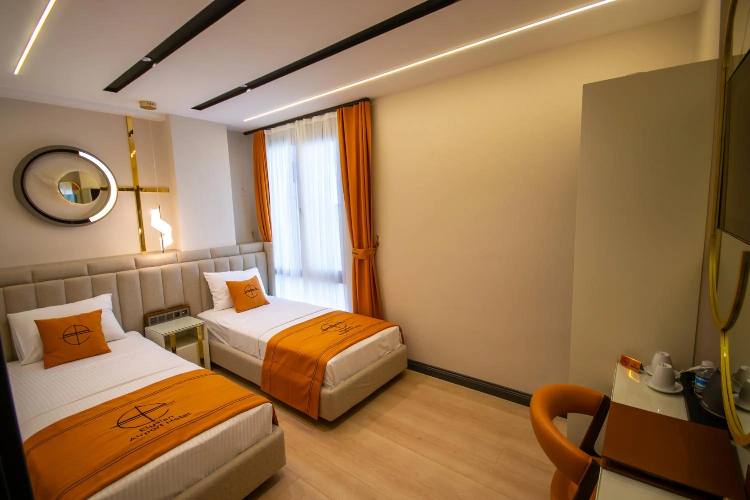 Bed in Elysian Airport Hotel & Restaurant