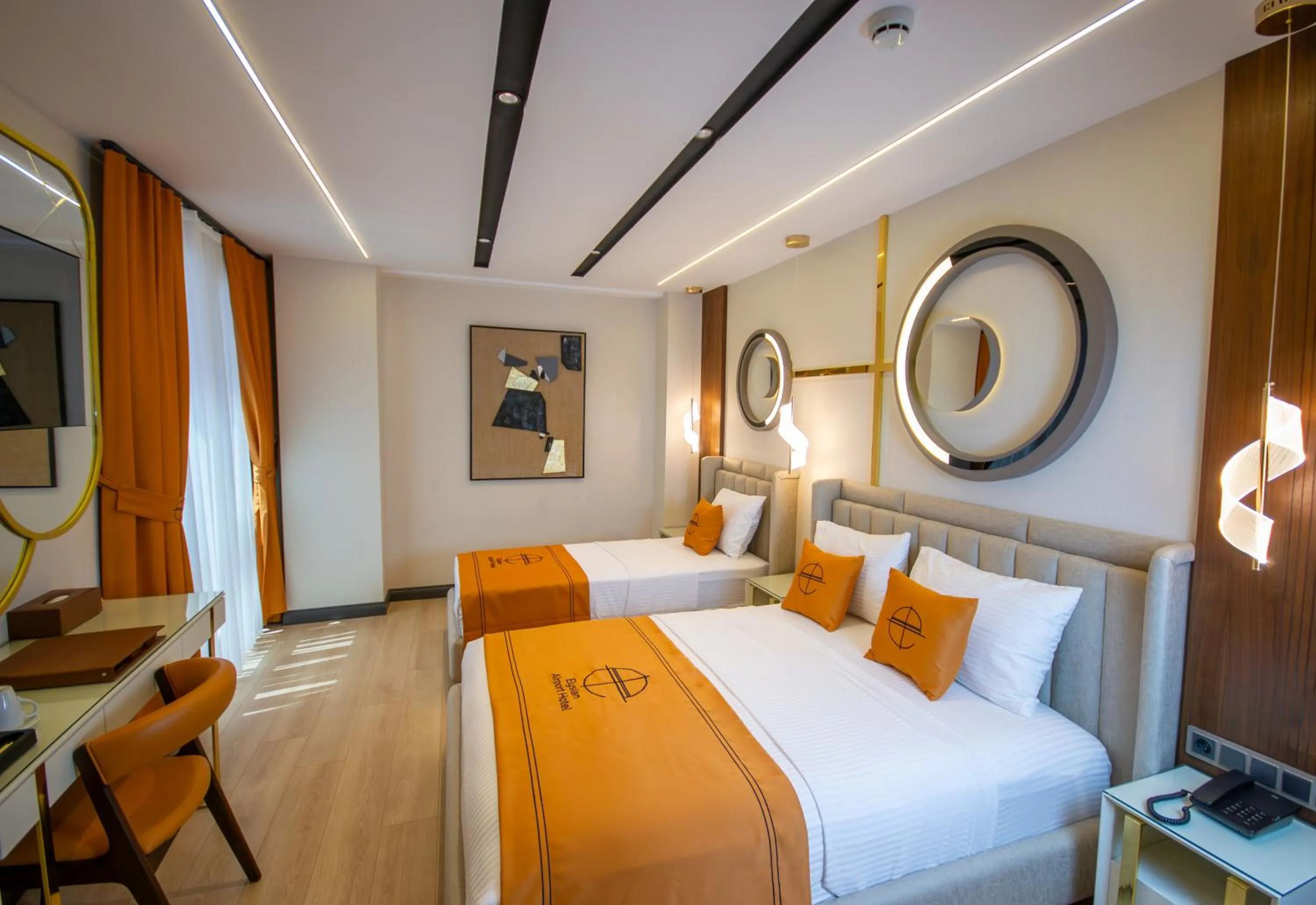 Bed in Elysian Airport Hotel & Restaurant