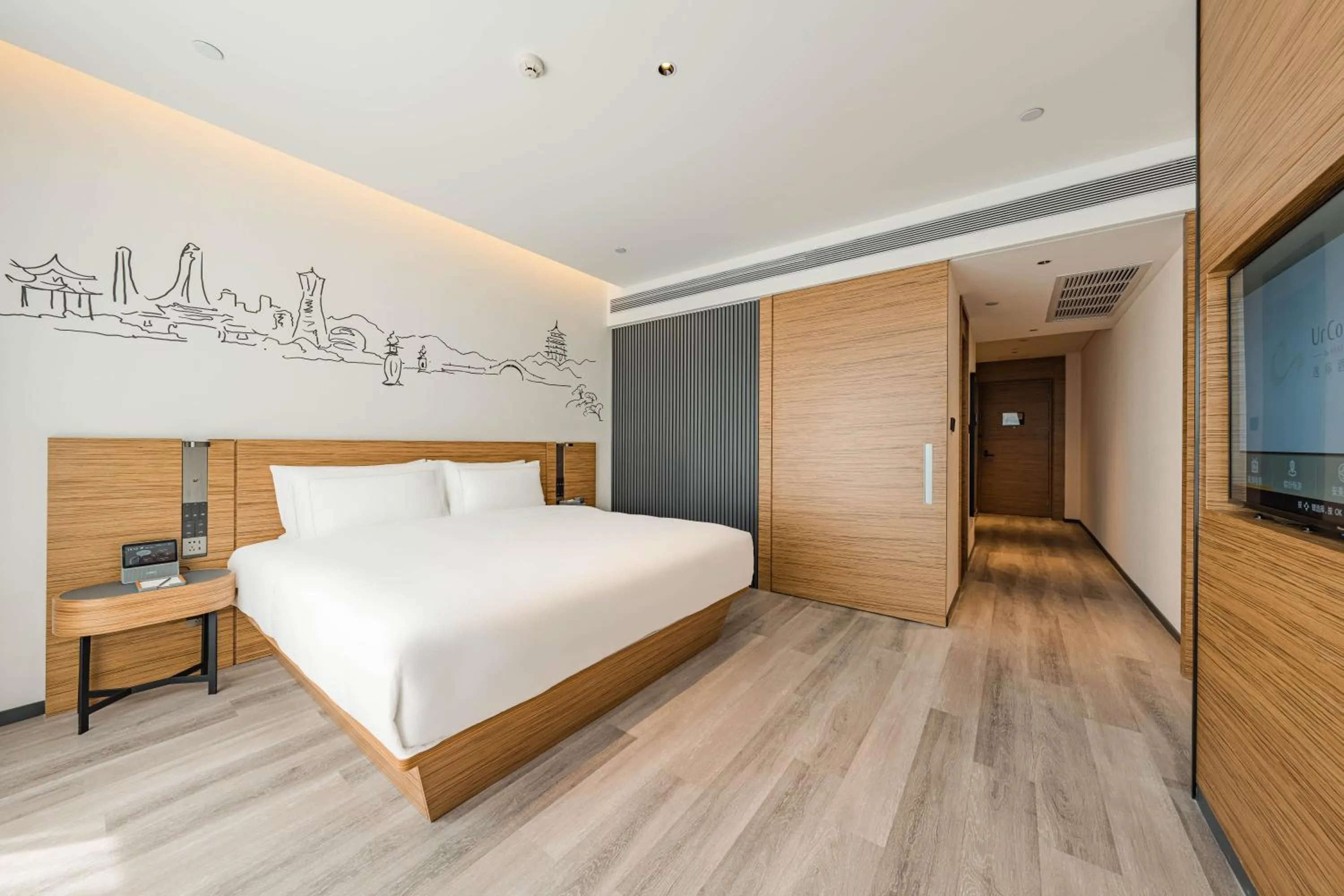 Bed in UrCove by HYATT Hangzhou Riverside CBD