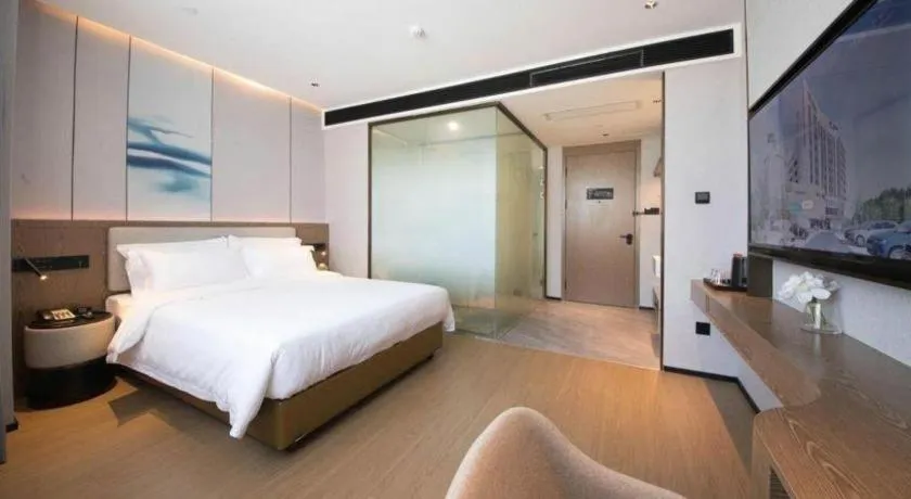 Bed in Yian Business Hotel
