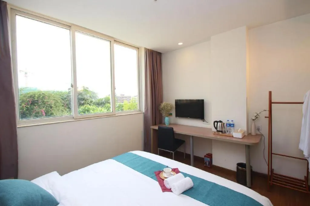 Bed in Yian Business Hotel