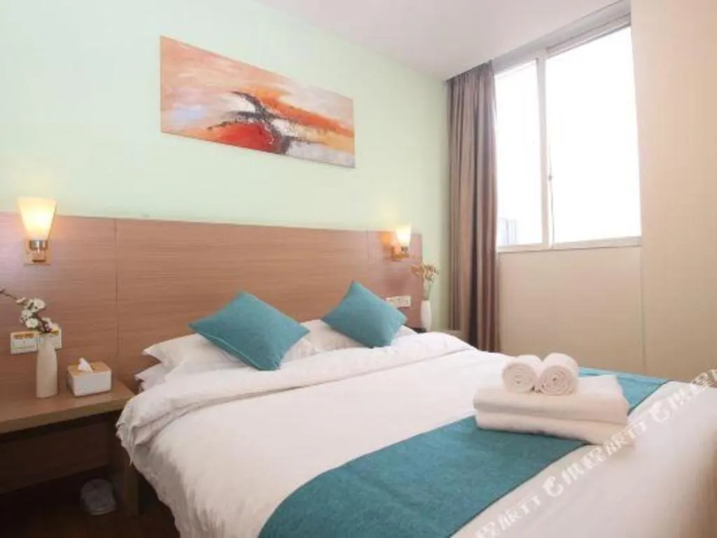 Bed in Yian Business Hotel